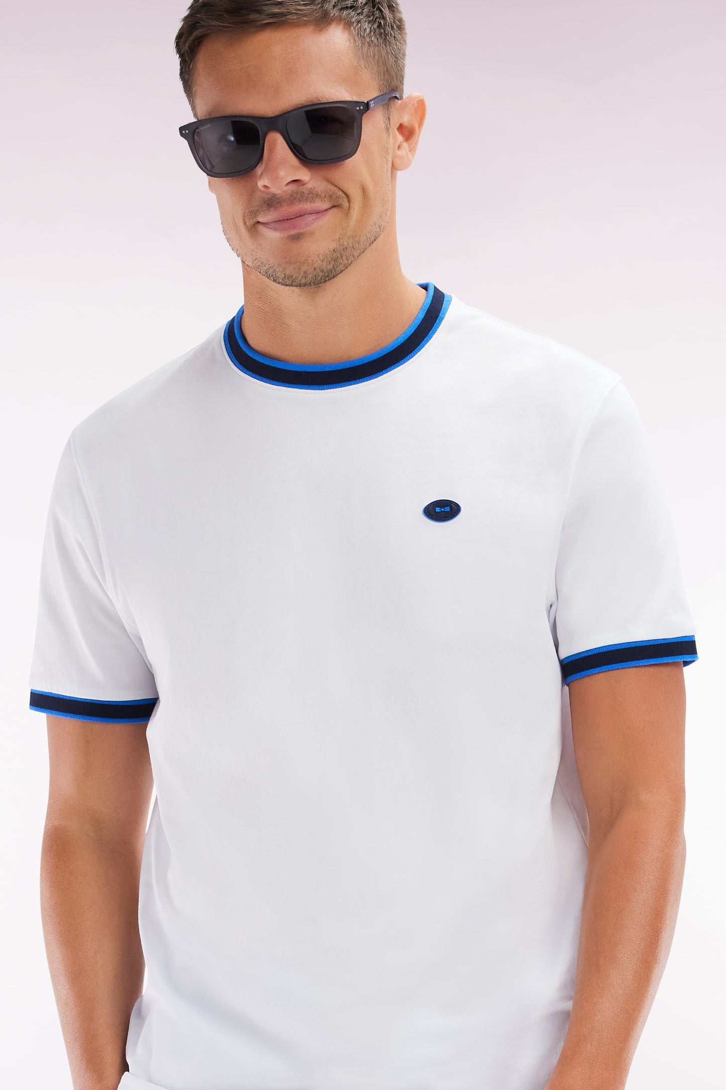 White cotton T-shirt with blue ribbing, relaxed fit