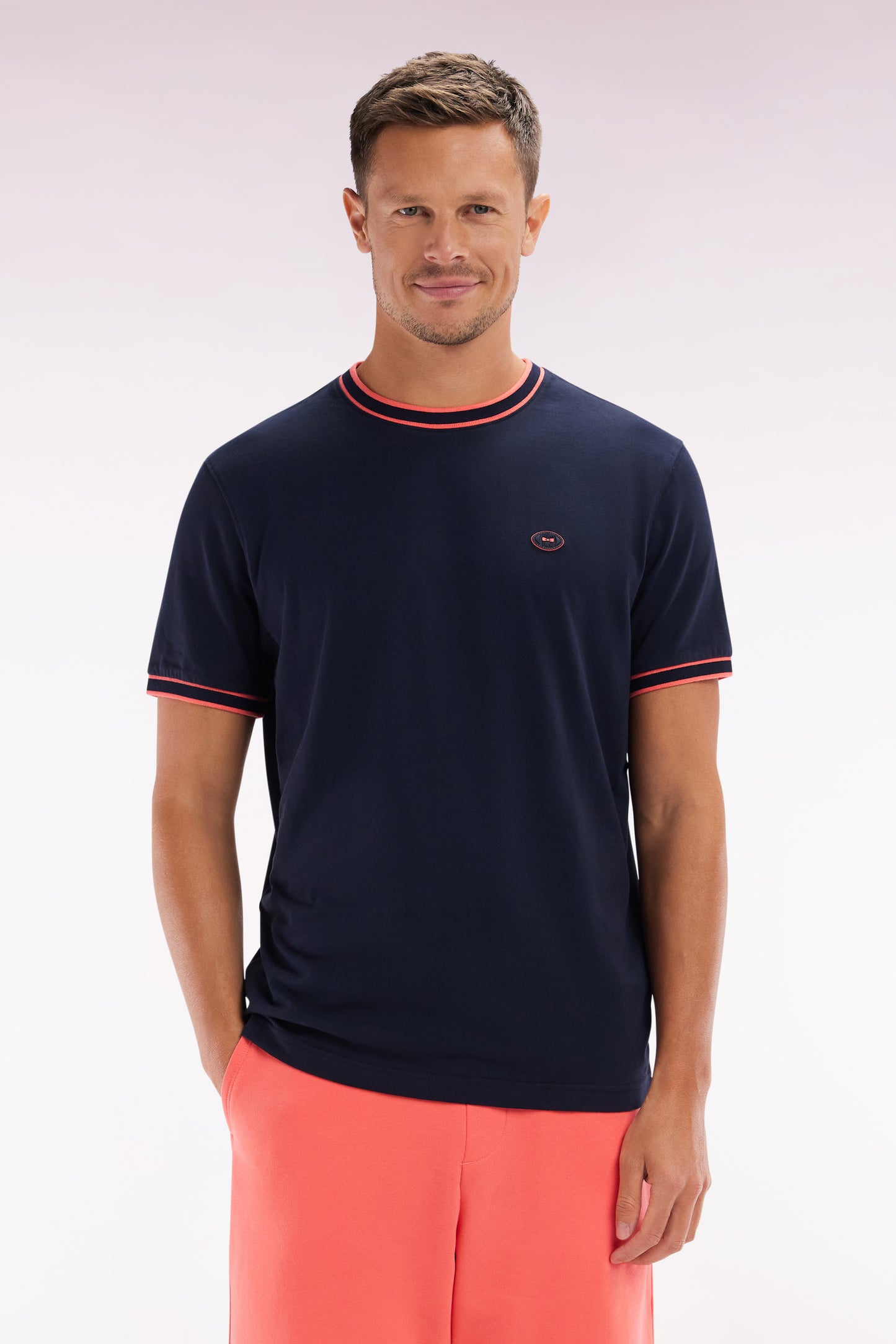 Navy cotton T-shirt with coral ribbing, relaxed fit