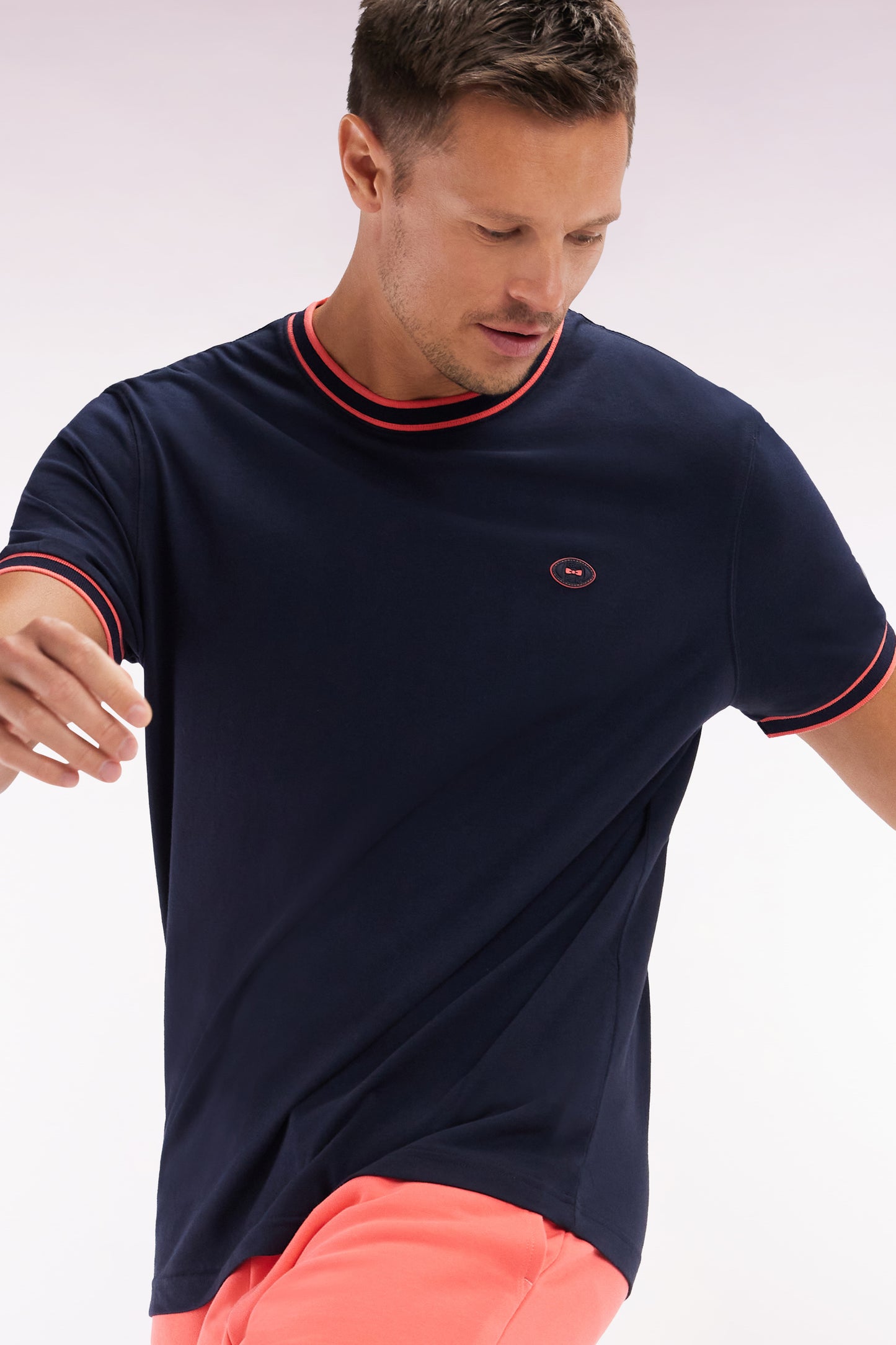 Navy cotton T-shirt with coral ribbing, relaxed fit
