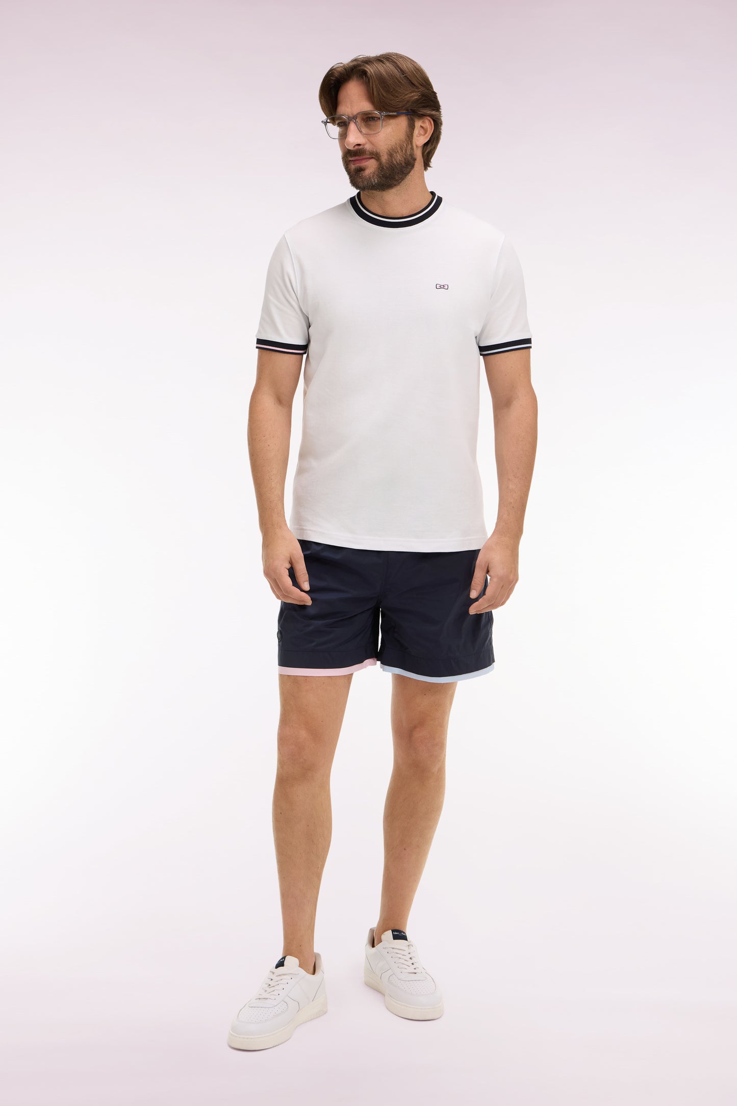 Navy swimsuit with contrasting piping