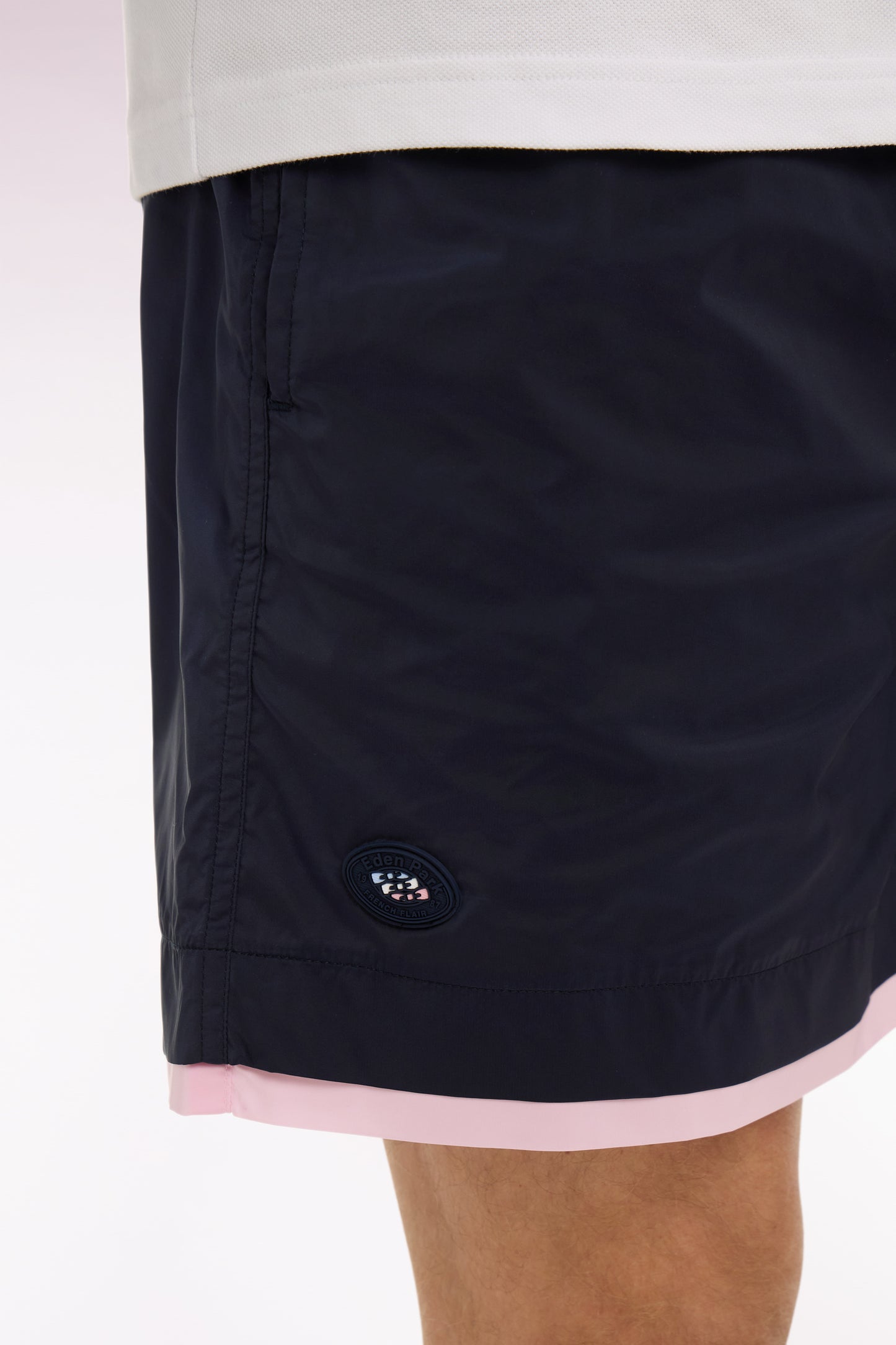 Navy swimsuit with contrasting piping