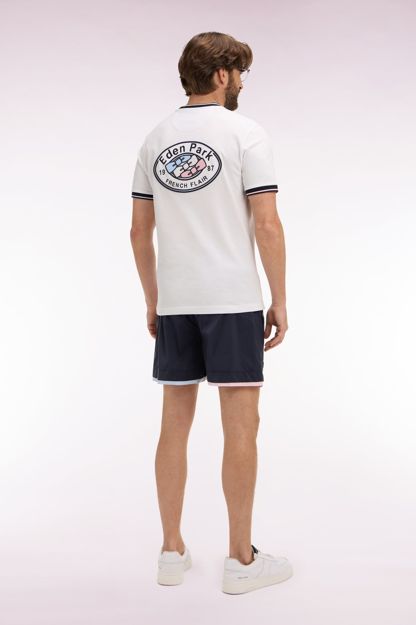 Navy swimsuit with contrasting piping