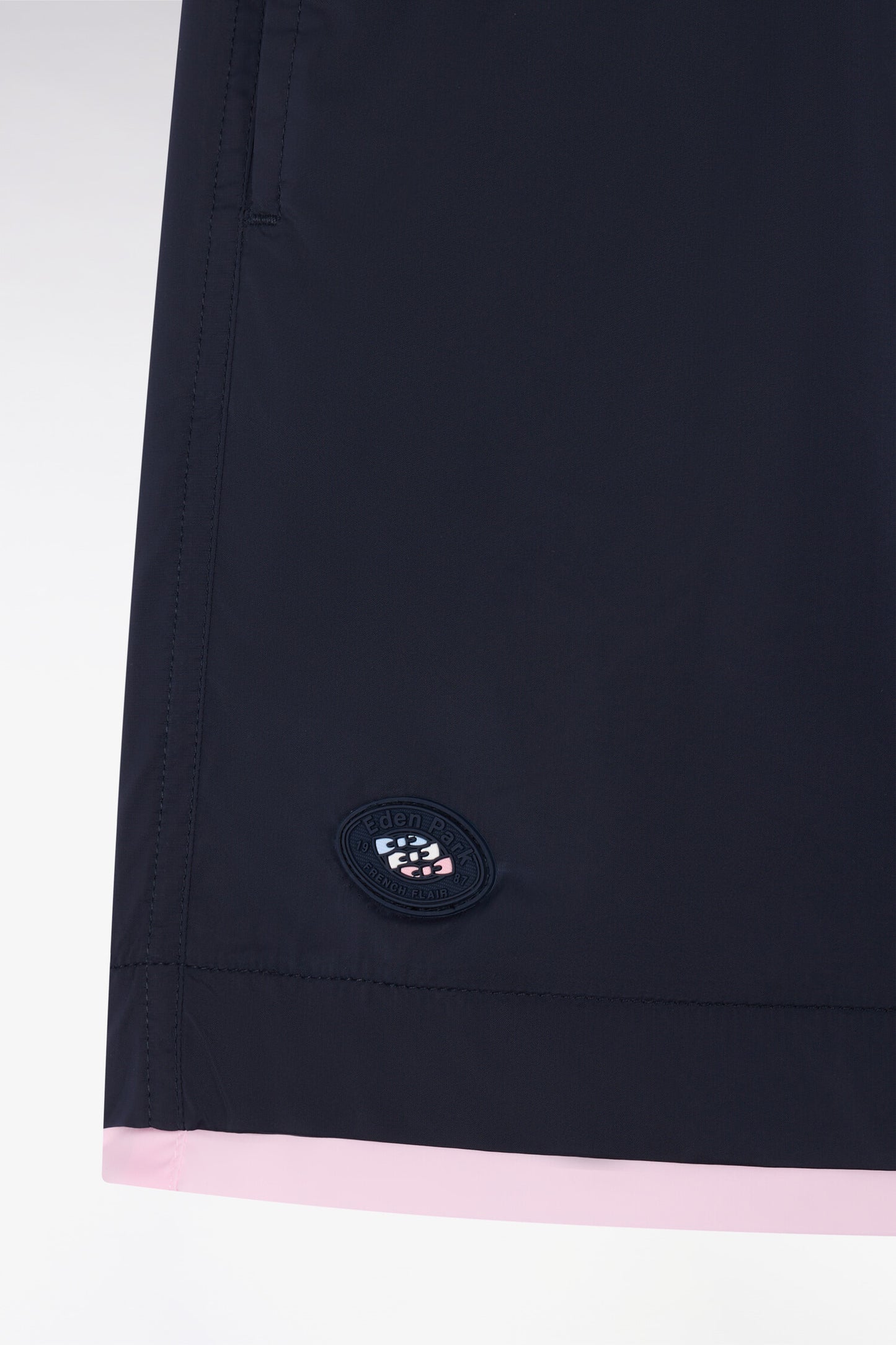 Navy swimsuit with contrasting piping