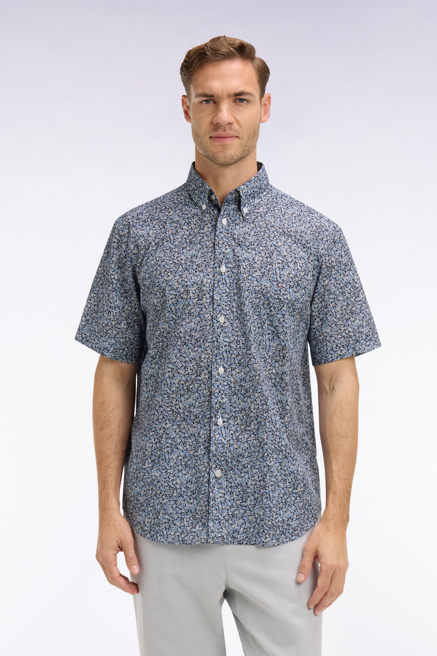 Short-sleeved blue cotton shirt with floral micro-pattern