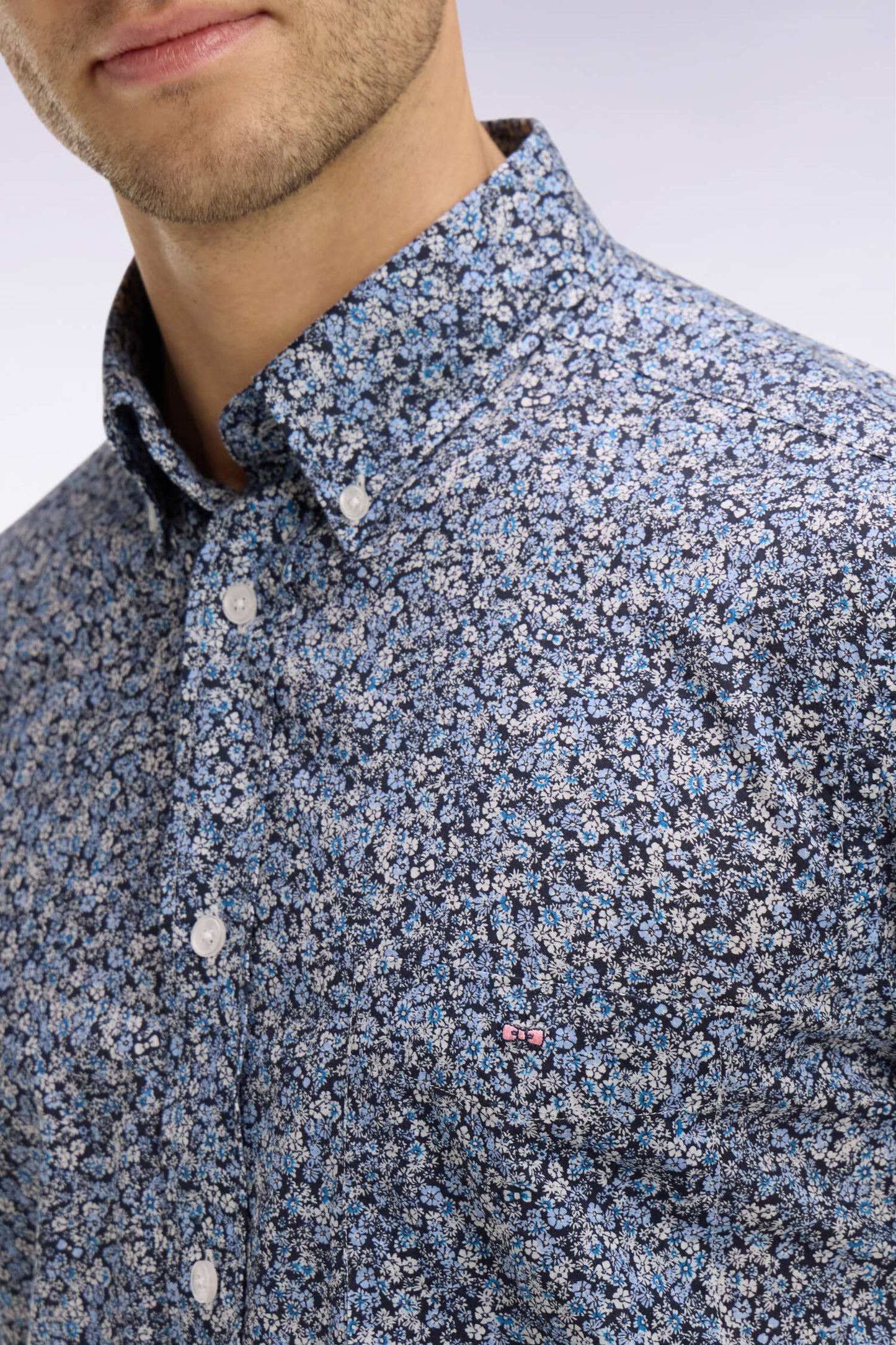 Short-sleeved blue cotton shirt with floral micro-pattern