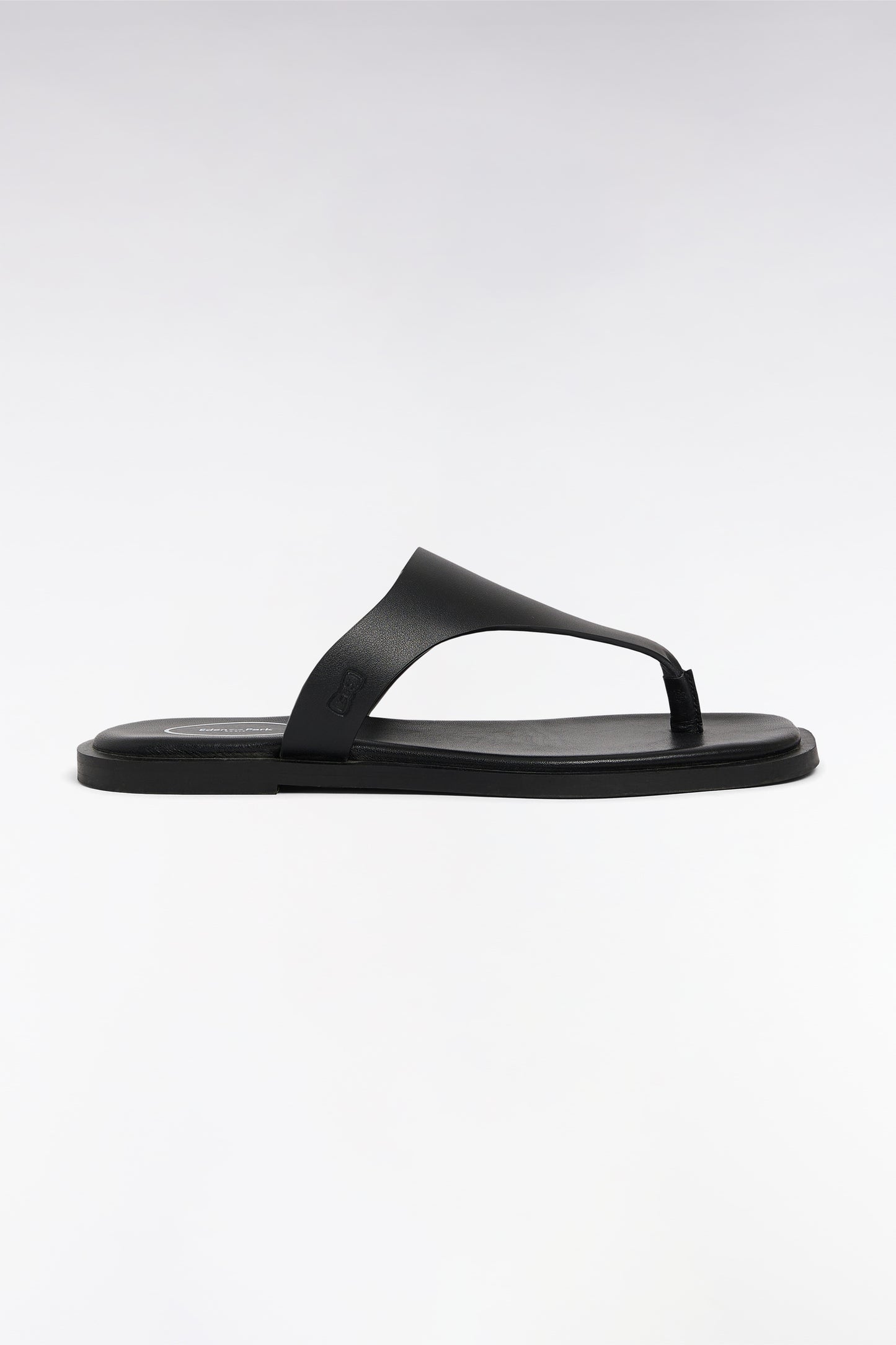 Black cowhide thong sandals