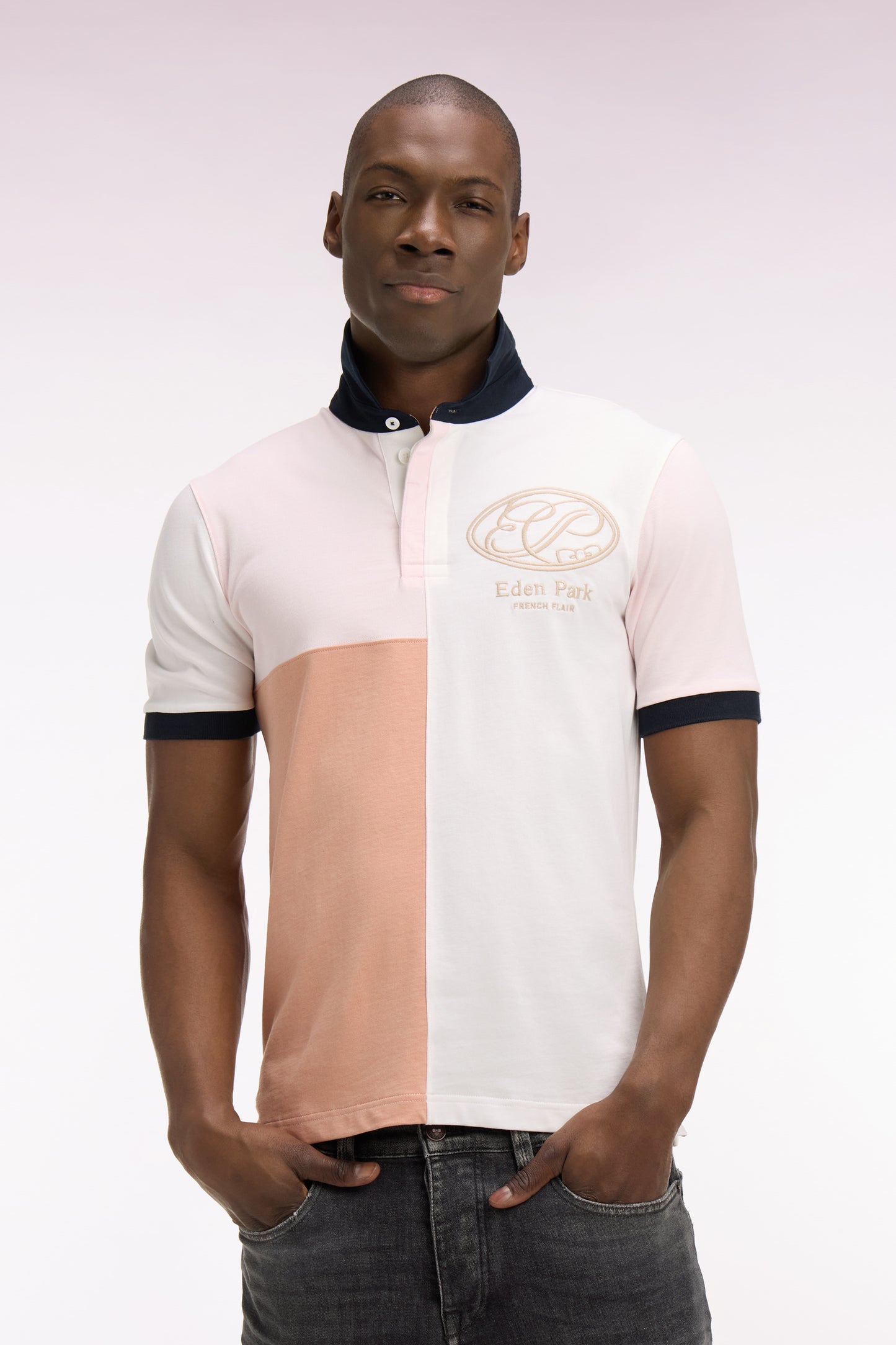 Pink short-sleeved jersey with graphic cutouts and regular-fit embroidery