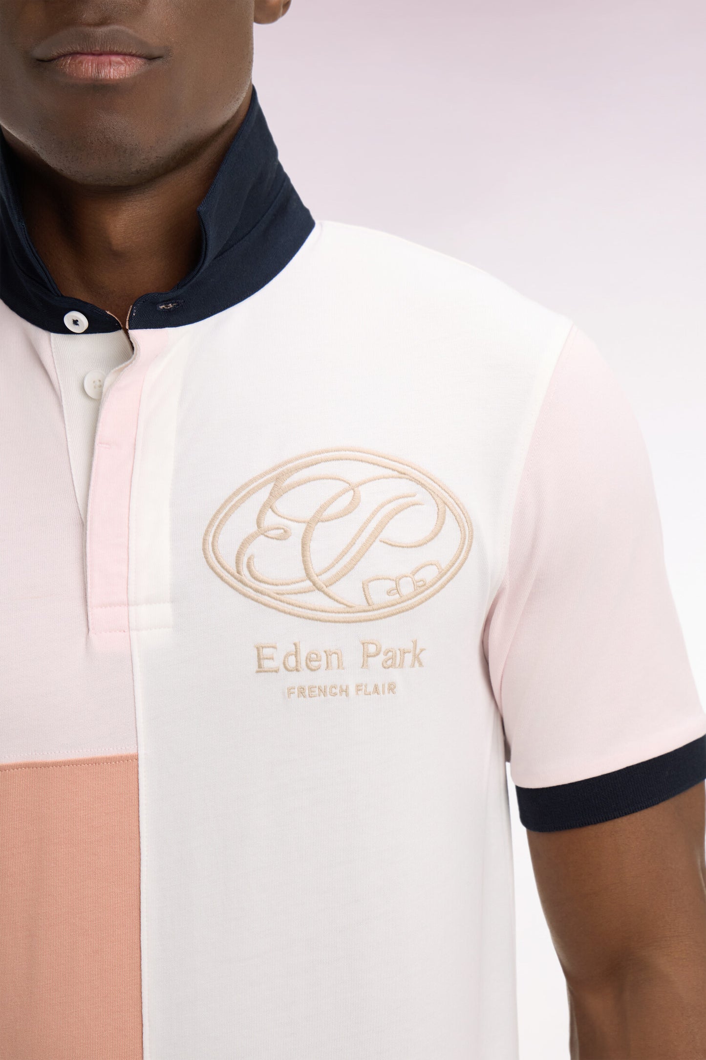 Pink short-sleeved jersey with graphic cutouts and regular-fit embroidery
