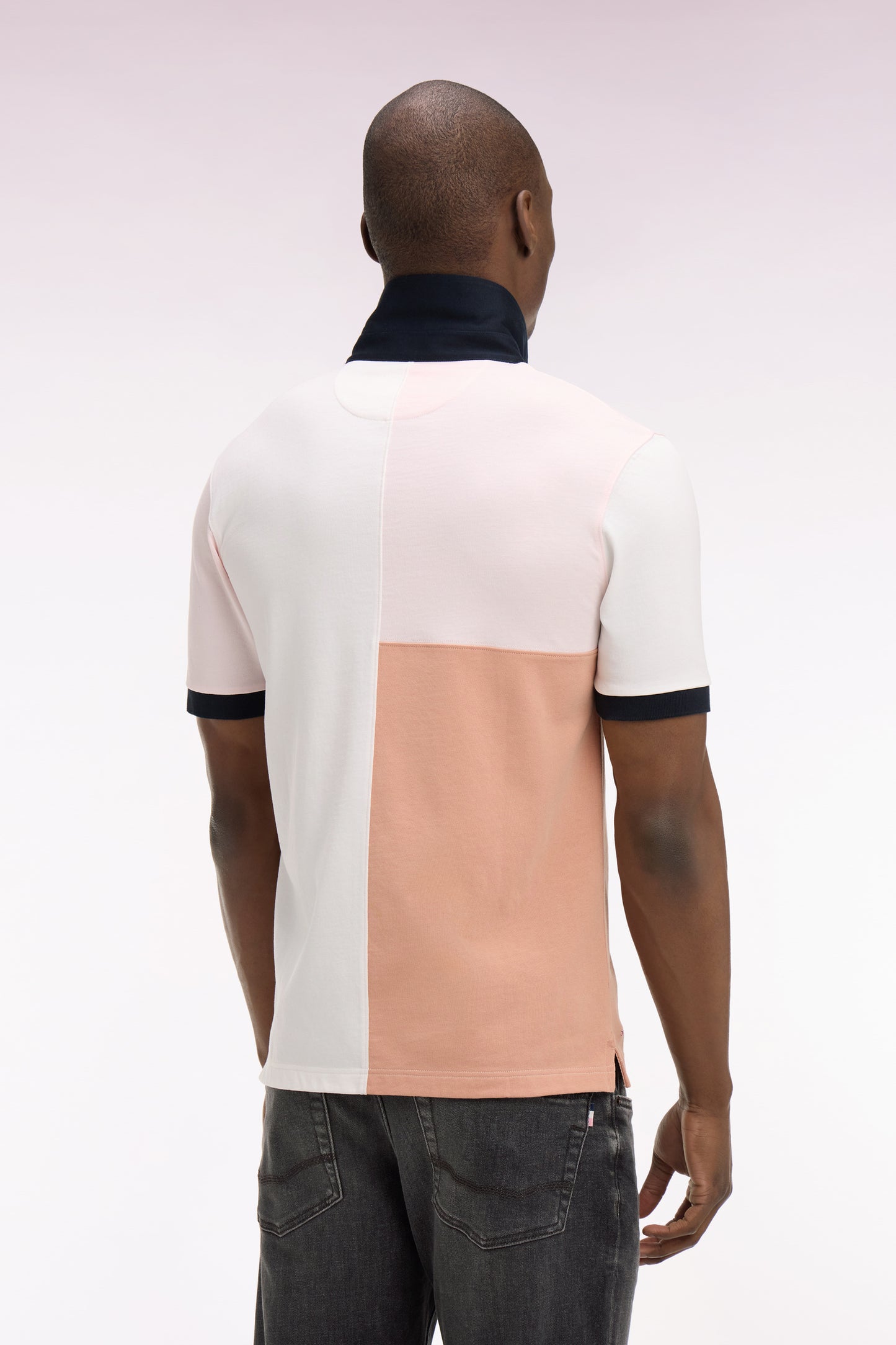 Pink short-sleeved jersey with graphic cutouts and regular-fit embroidery