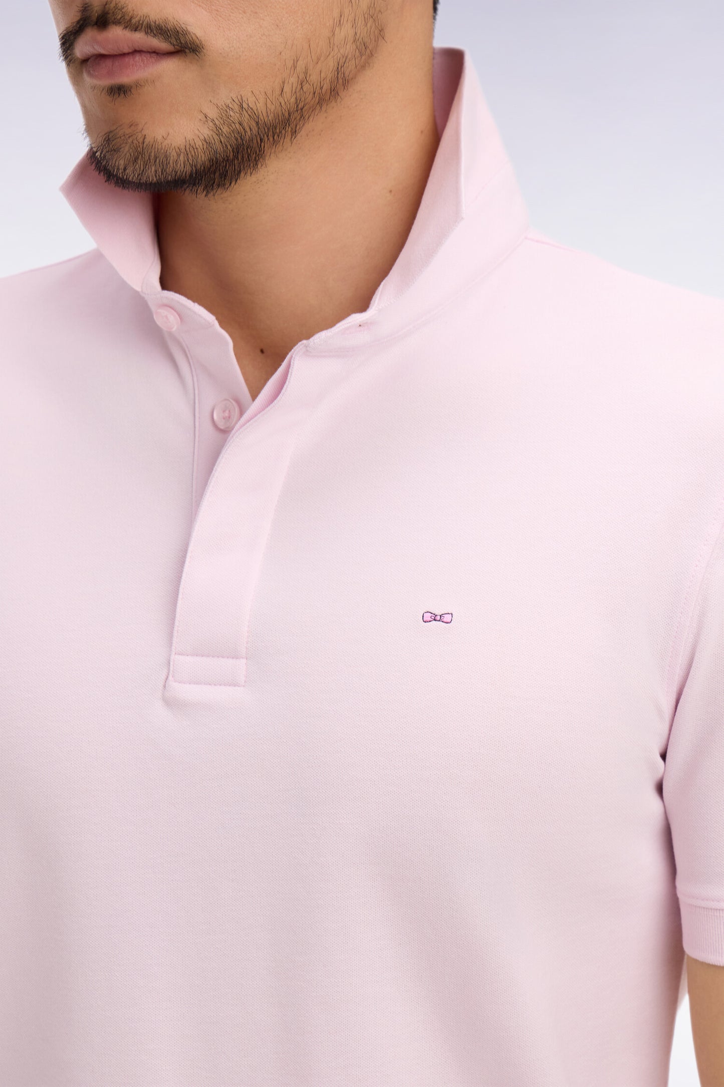 Polo à manches courtes en coton rose coupe slim