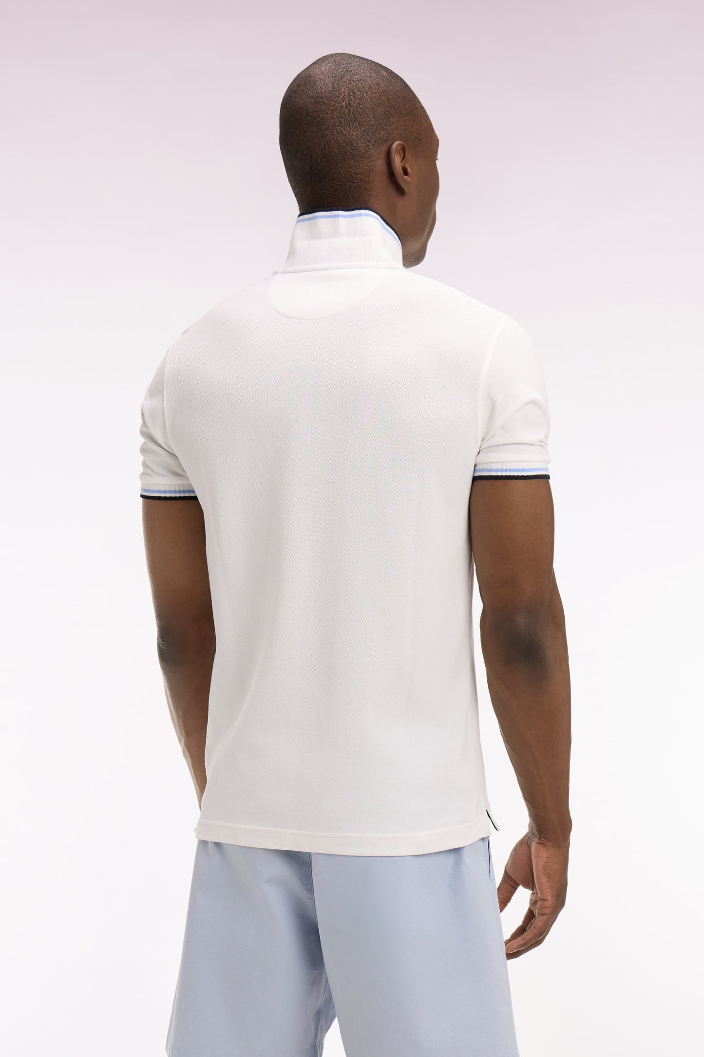 Short-sleeved white cotton polo shirt with striped details, regular fit