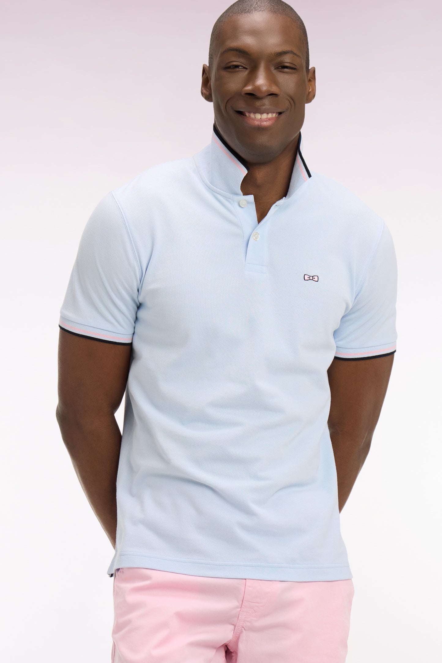 Short-sleeved polo shirt in sky cotton with striped details, regular fit
