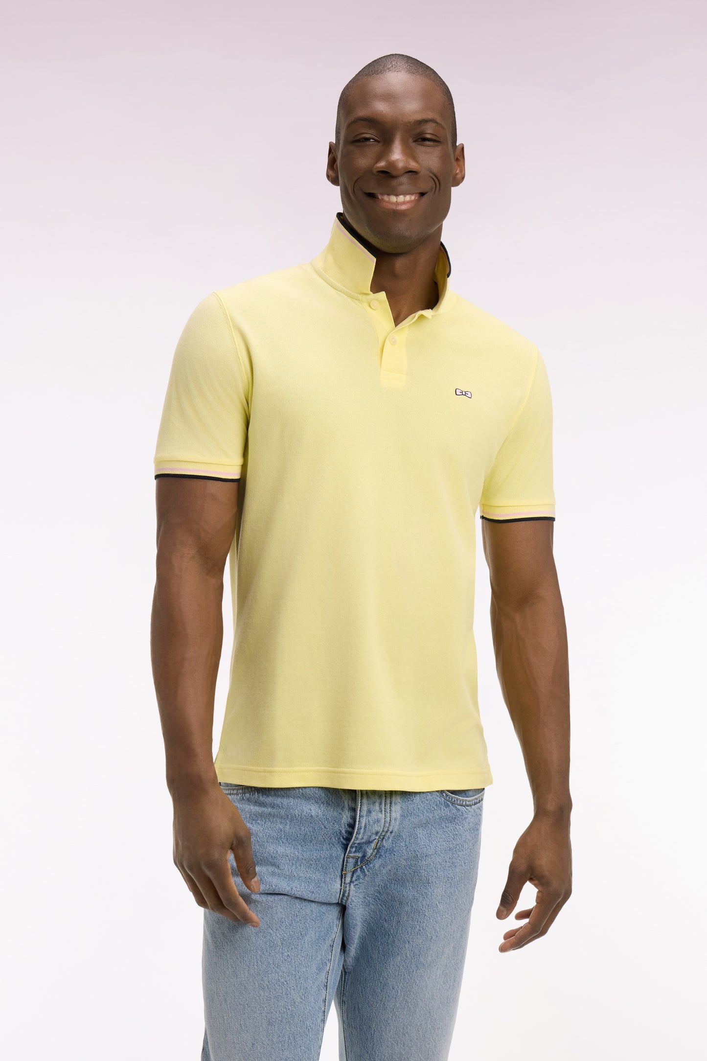 Short-sleeved polo shirt in yellow cotton with striped details, regular fit