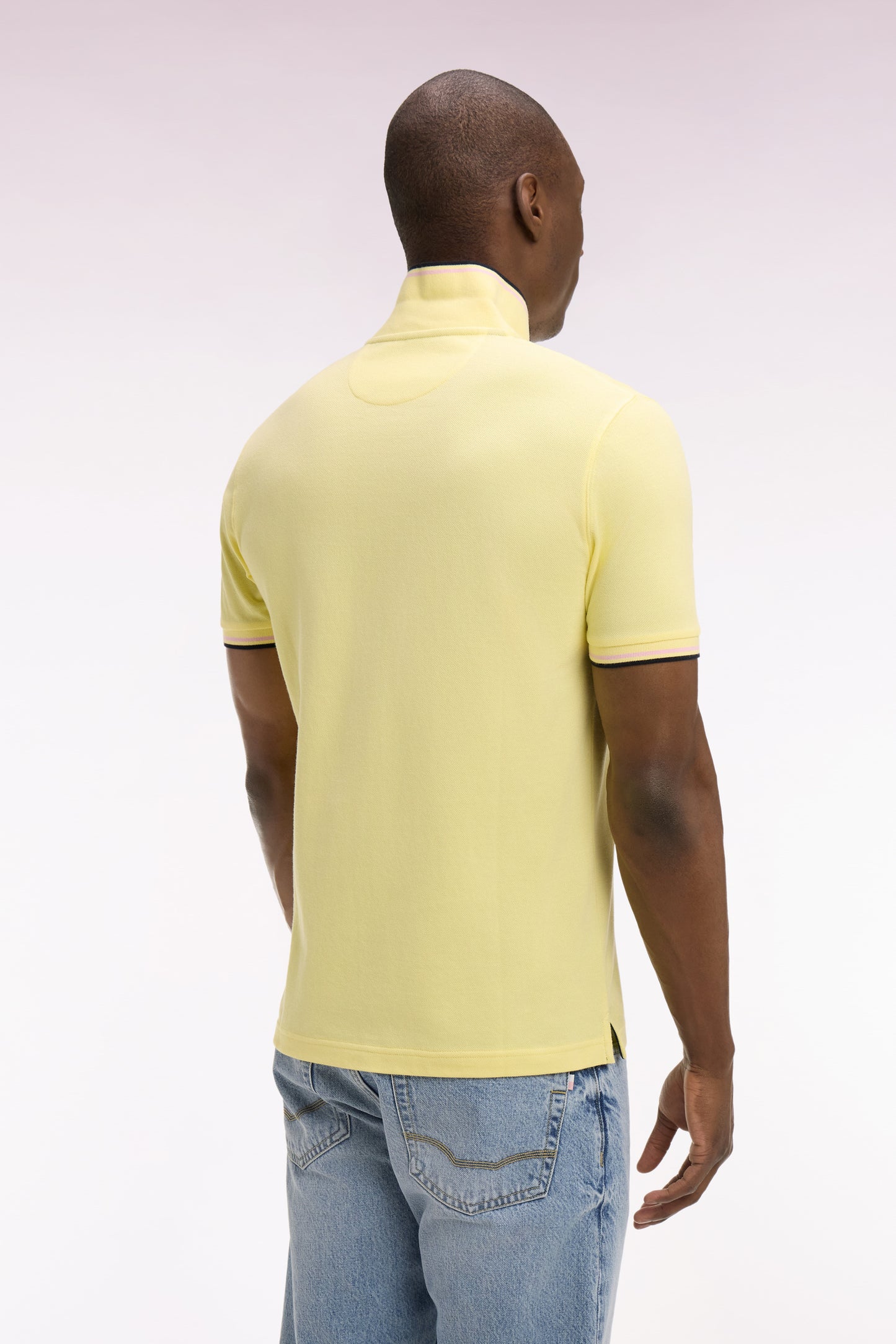 Short-sleeved polo shirt in yellow cotton with striped details, regular fit