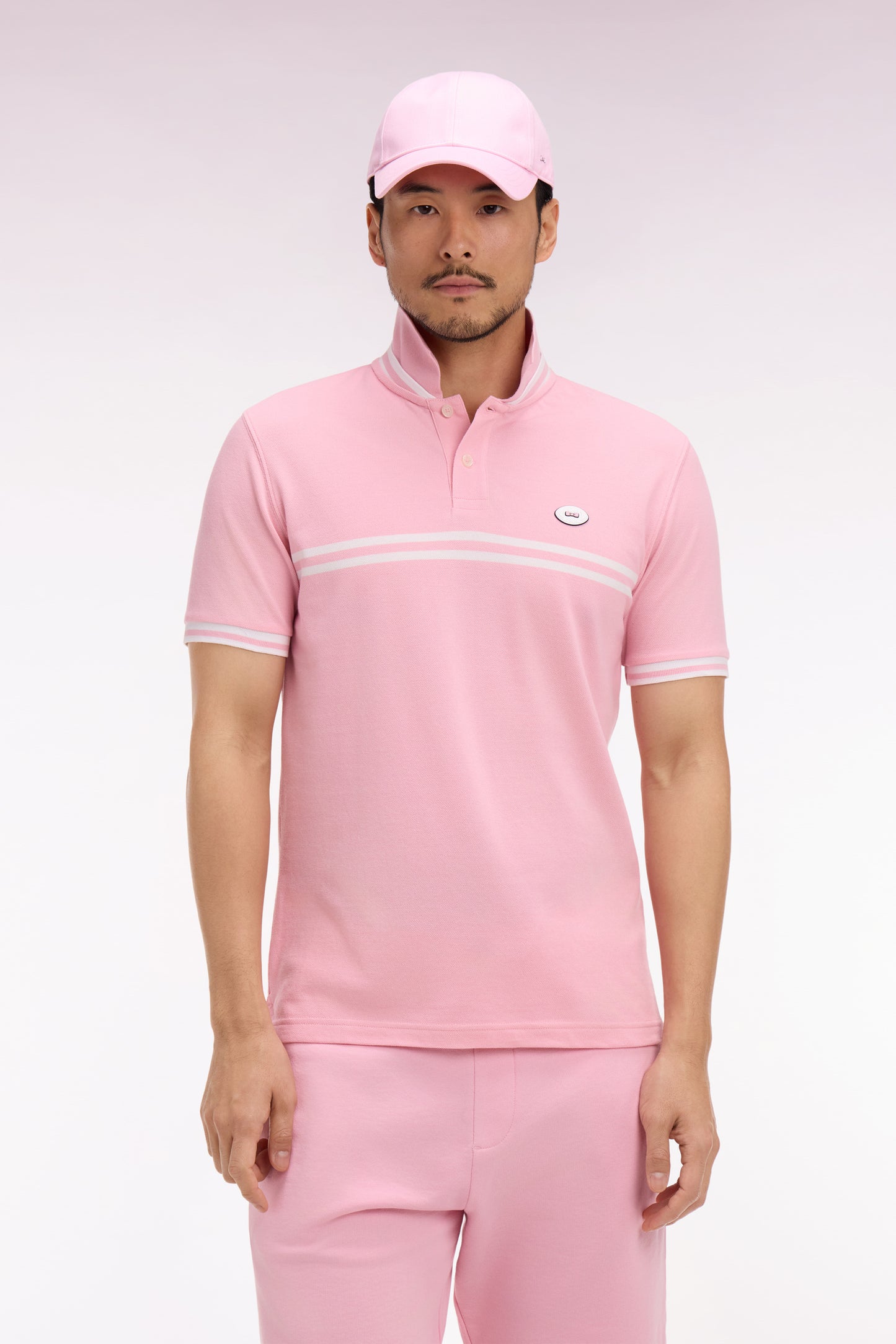 Polo à manches courtes en coton rose à rayures blanches coupe regular