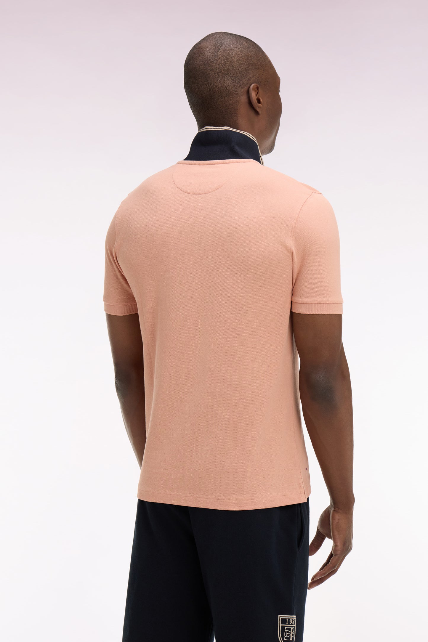 Polo à manches courtes en piqué coton saumon écusson EP