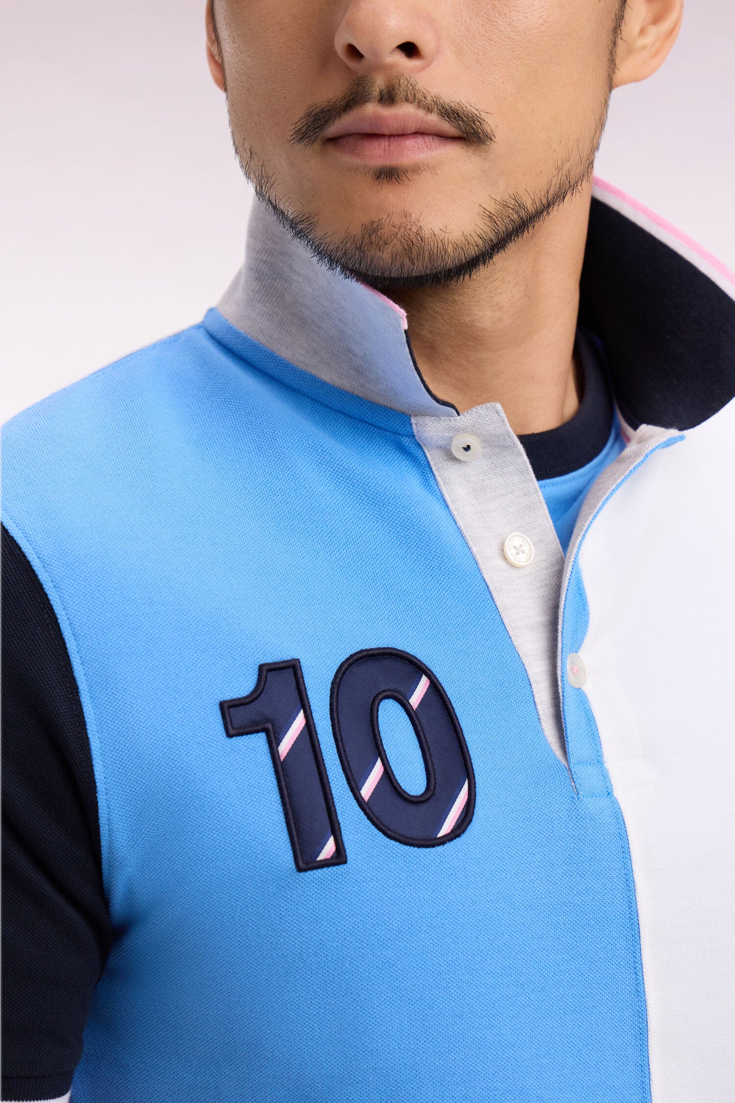 Polo à manches courtes XV de France en coton bleu à découpes verticales