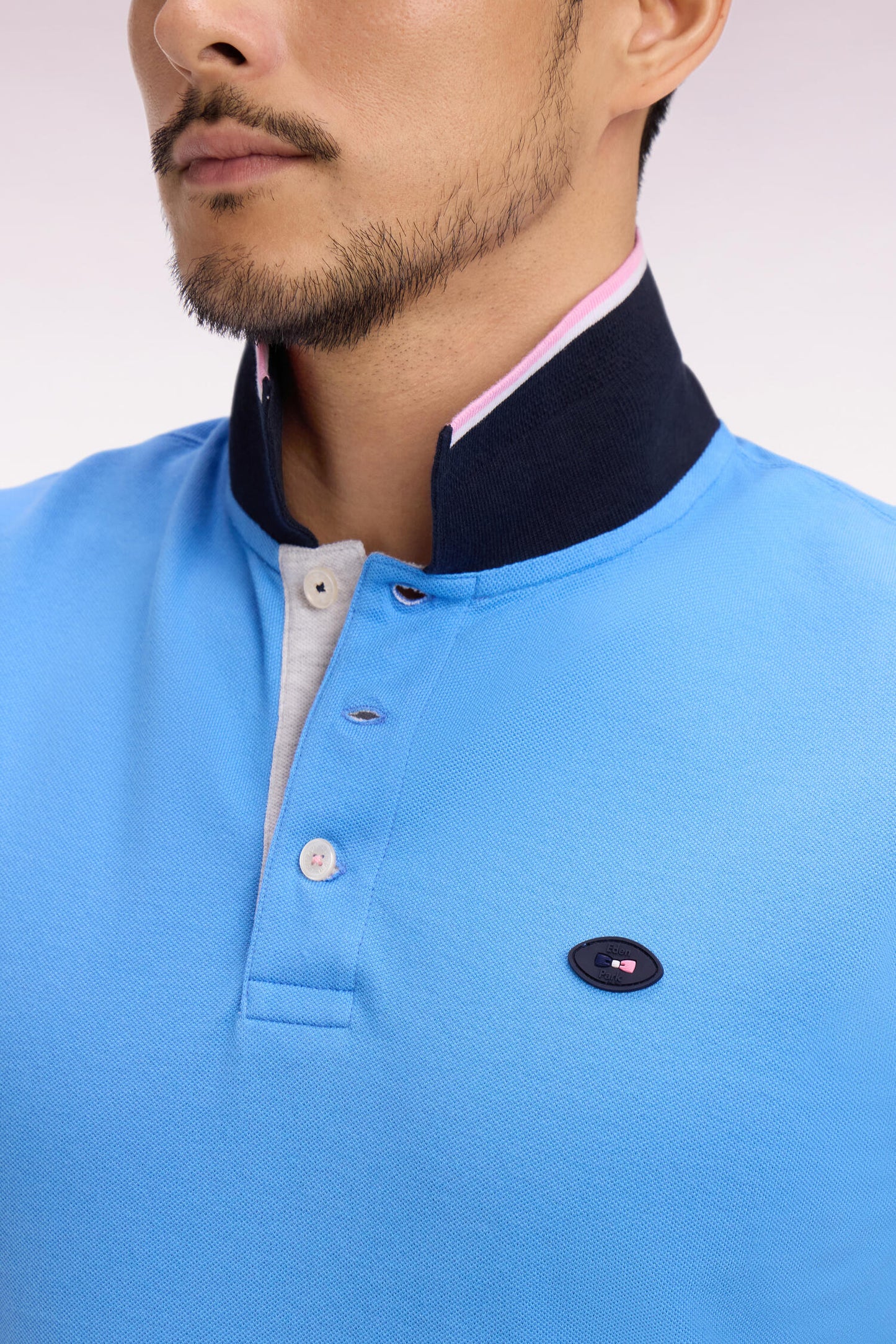 XV de France short-sleeved polo shirt in blue cotton pique with cut-out sleeves