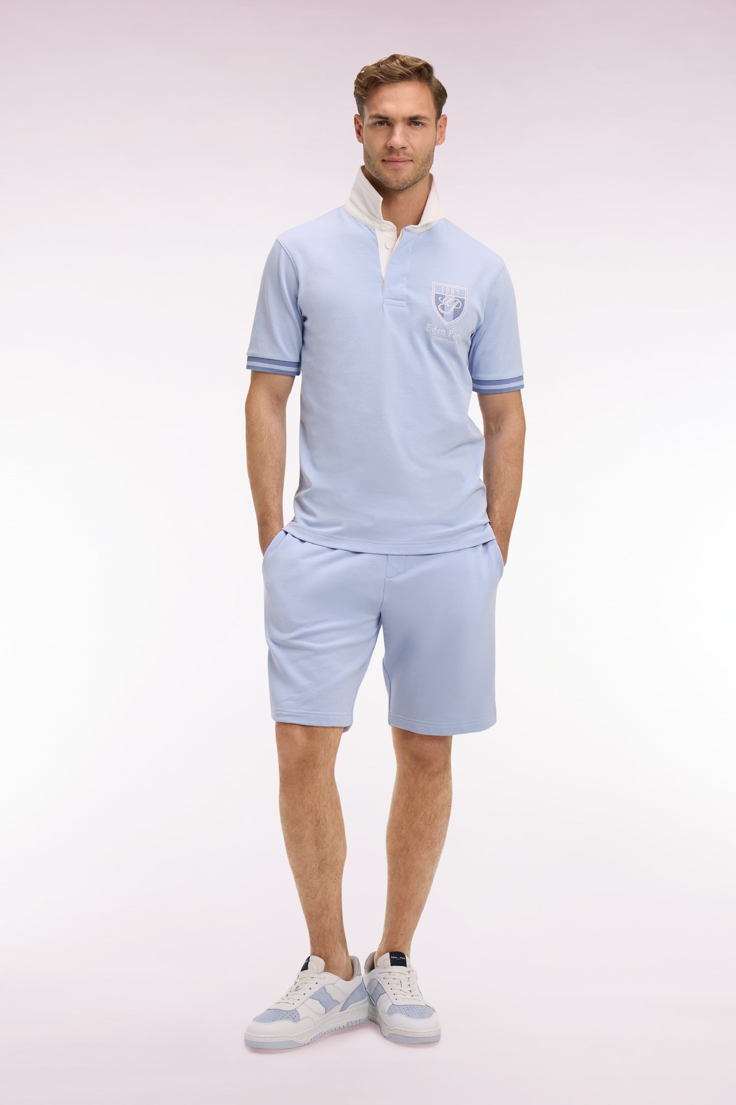Sky cotton fleece shorts with coat of arms embroidery