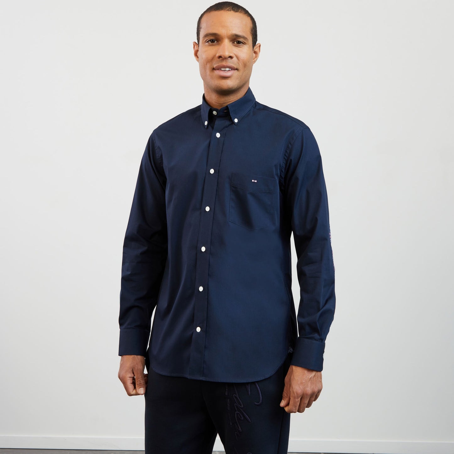 Navy blue shirt with floral detail