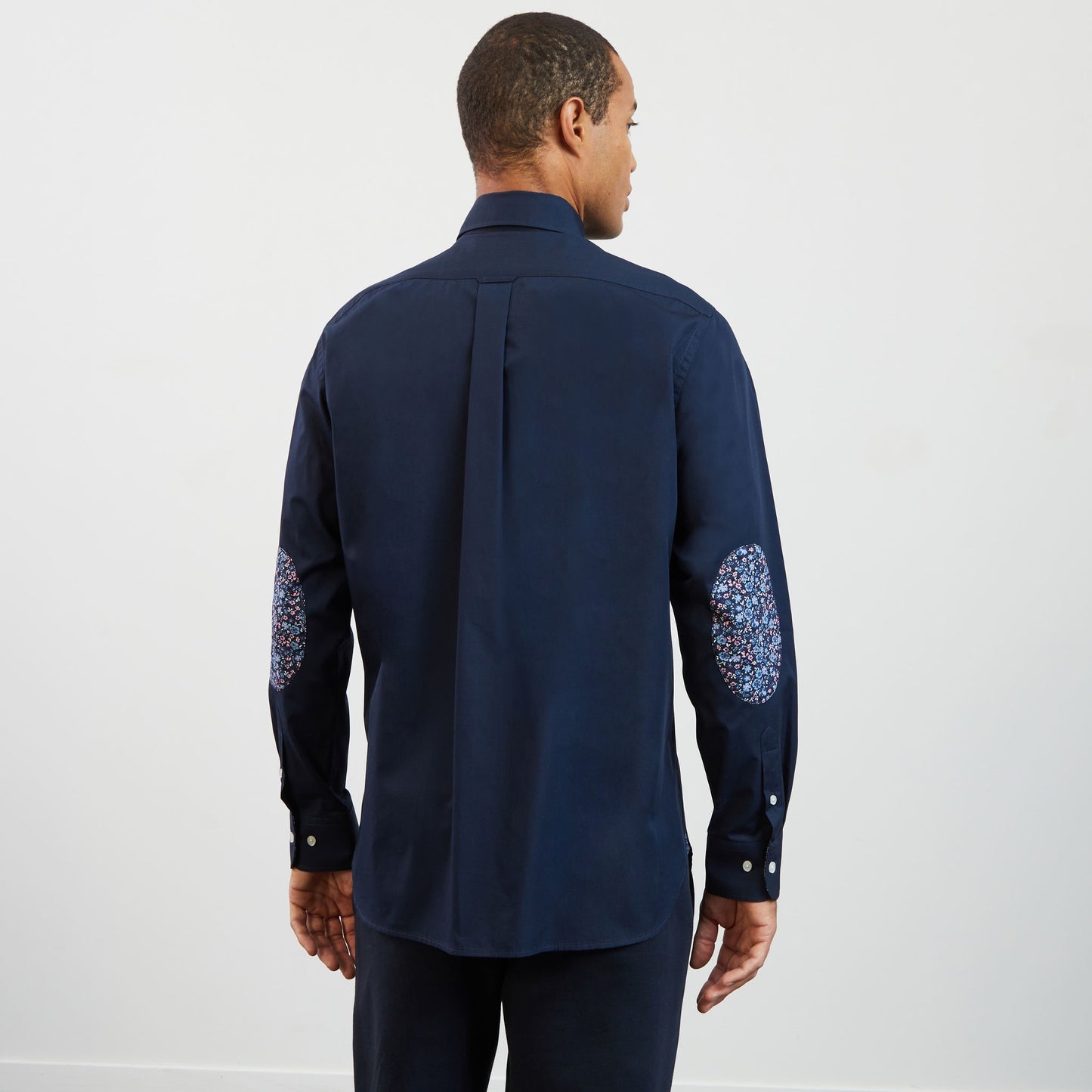 Navy blue shirt with floral detail