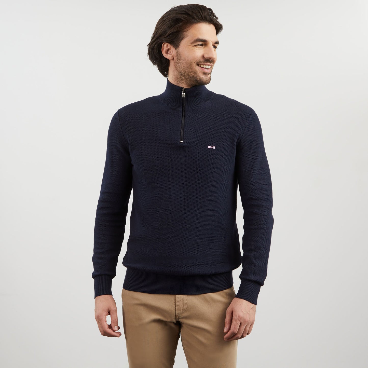 Dark blue zip-neck jumper in decorative cable knit