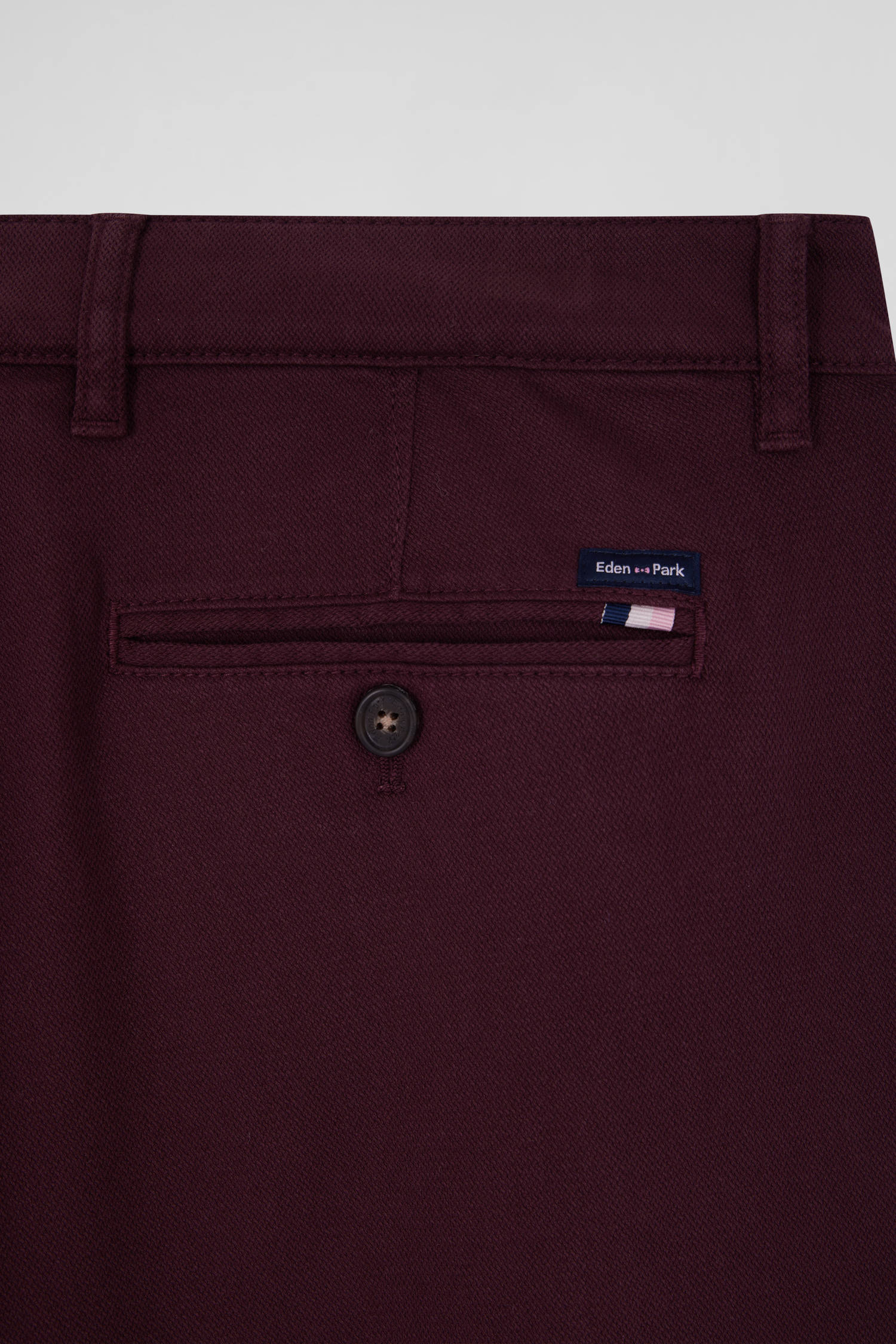 Pantalon chino en piqué de coton stretch et modal bordeaux coupe Regular