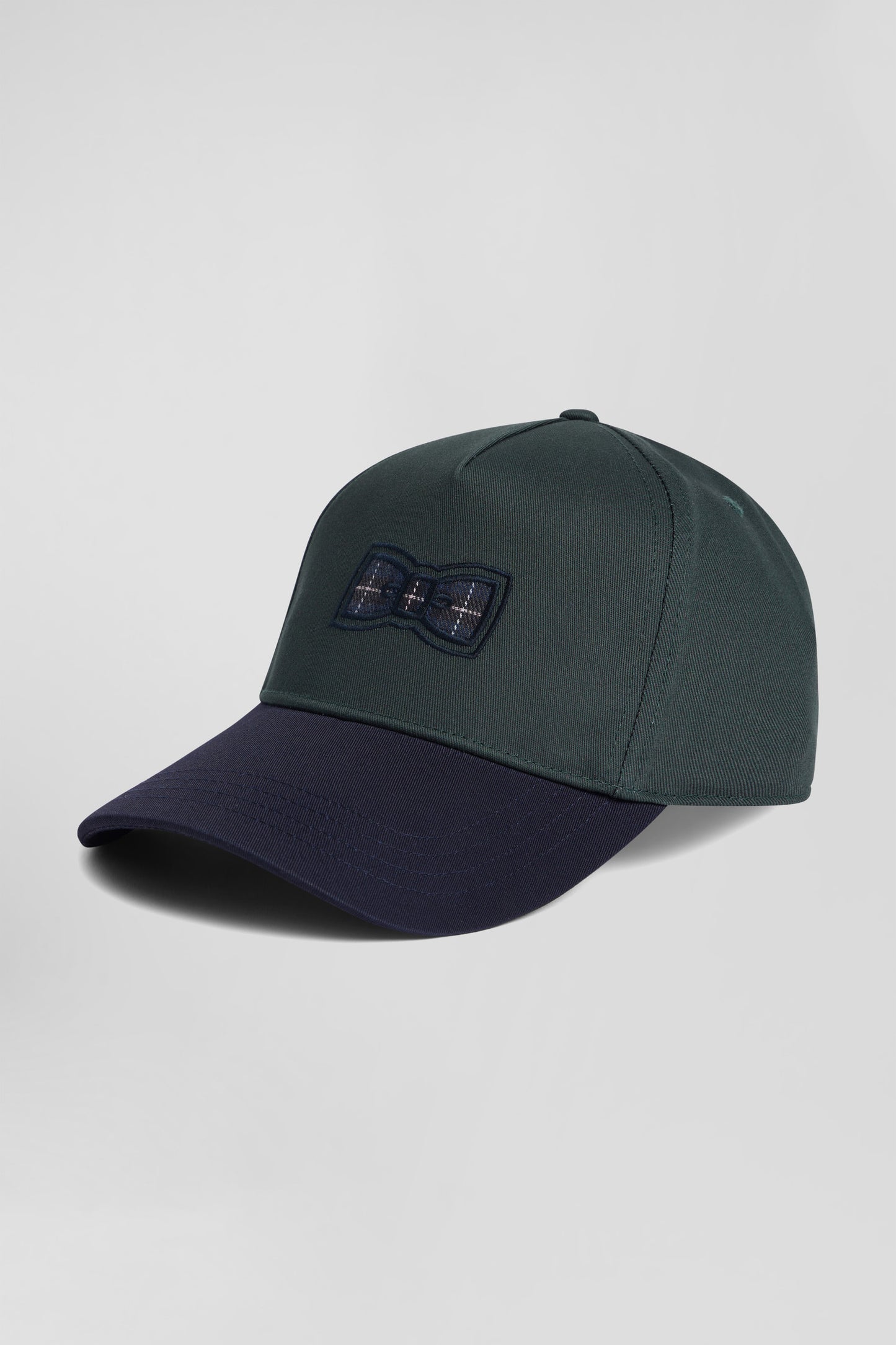 Green and navy cotton cap with tricolour details