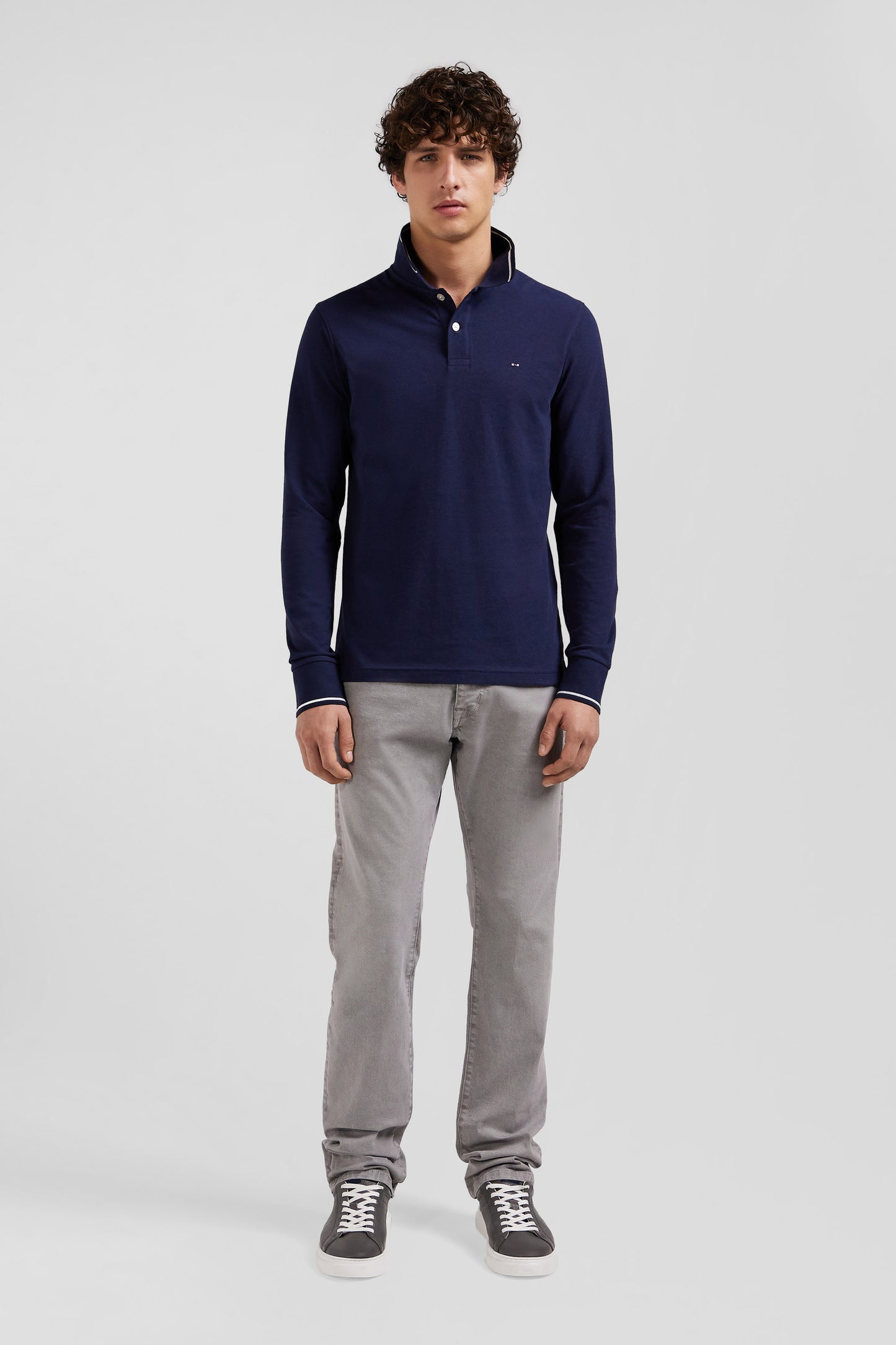 Slim navy blue long-sleeved stretch cotton polo shirt with striped finishes