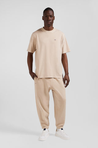 Oversize beige unisex short-sleeved T-shirt in overdyed cotton