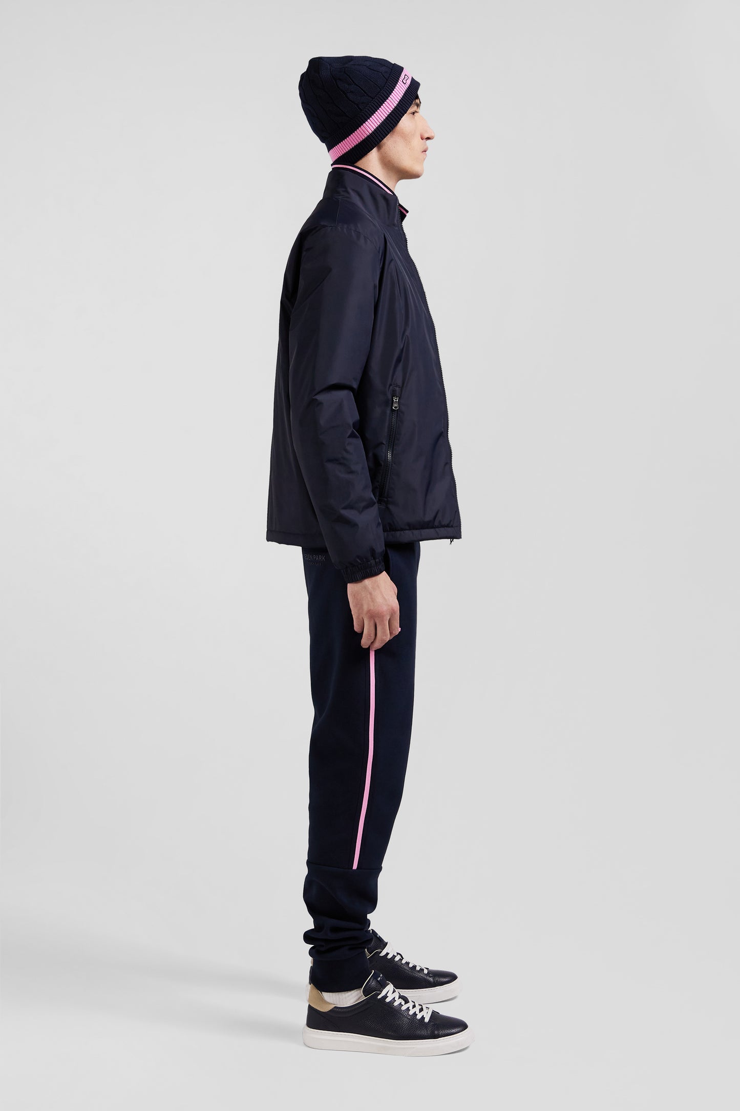 Navy blue matte nylon windbreaker with striped back embroidery