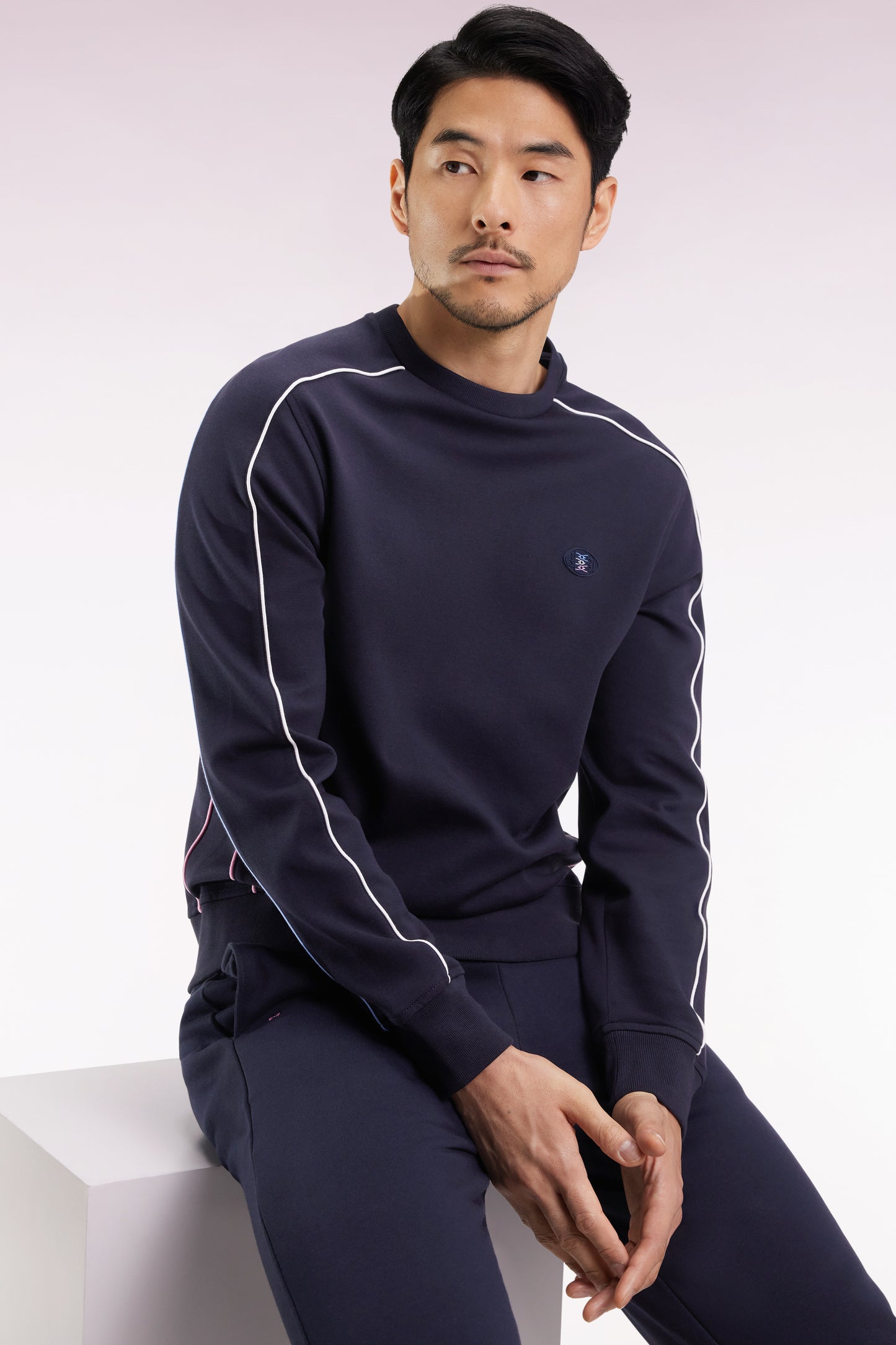 Navy fleece sweatshirt with colored piping