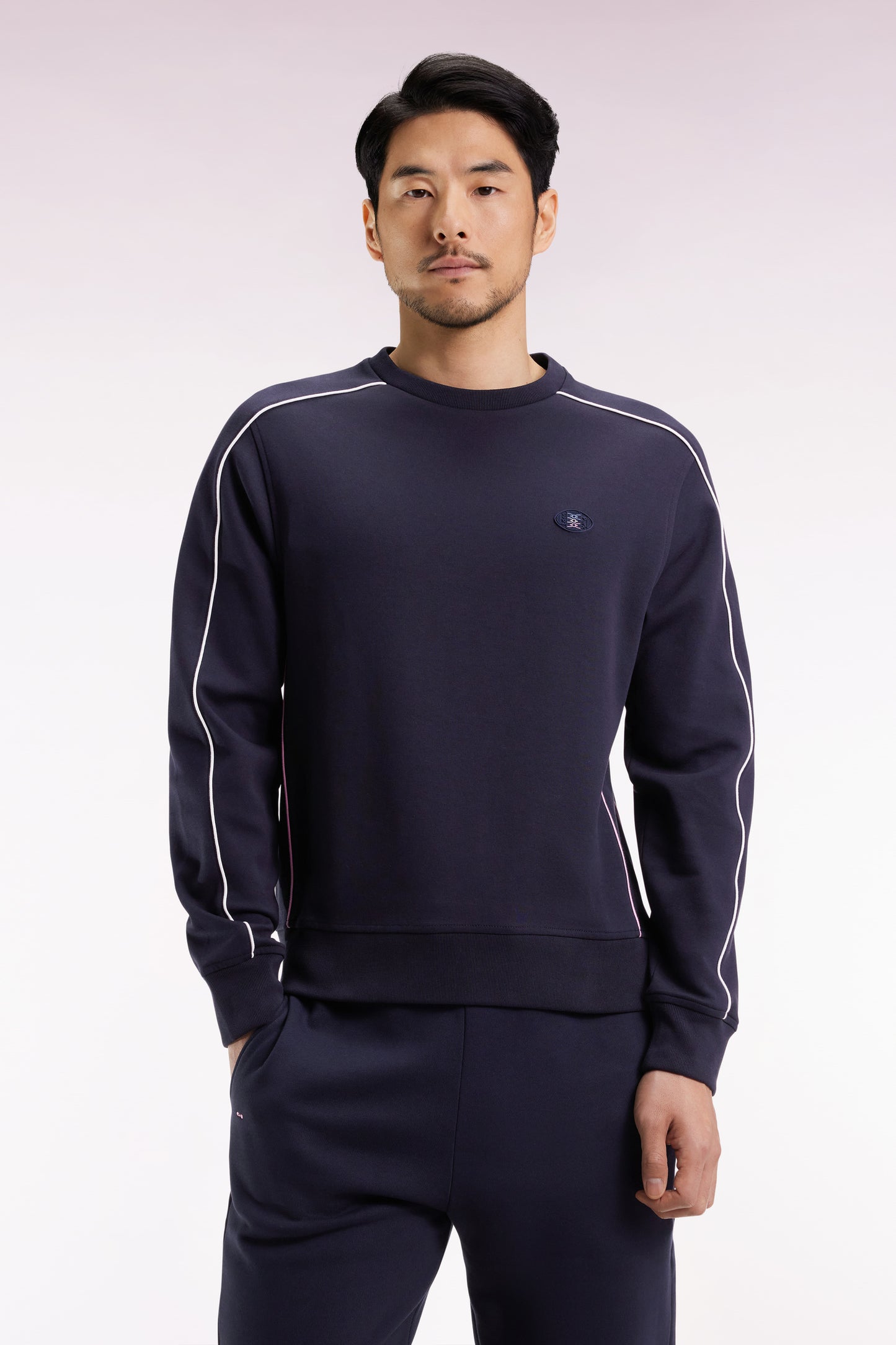 Navy fleece sweatshirt with colored piping