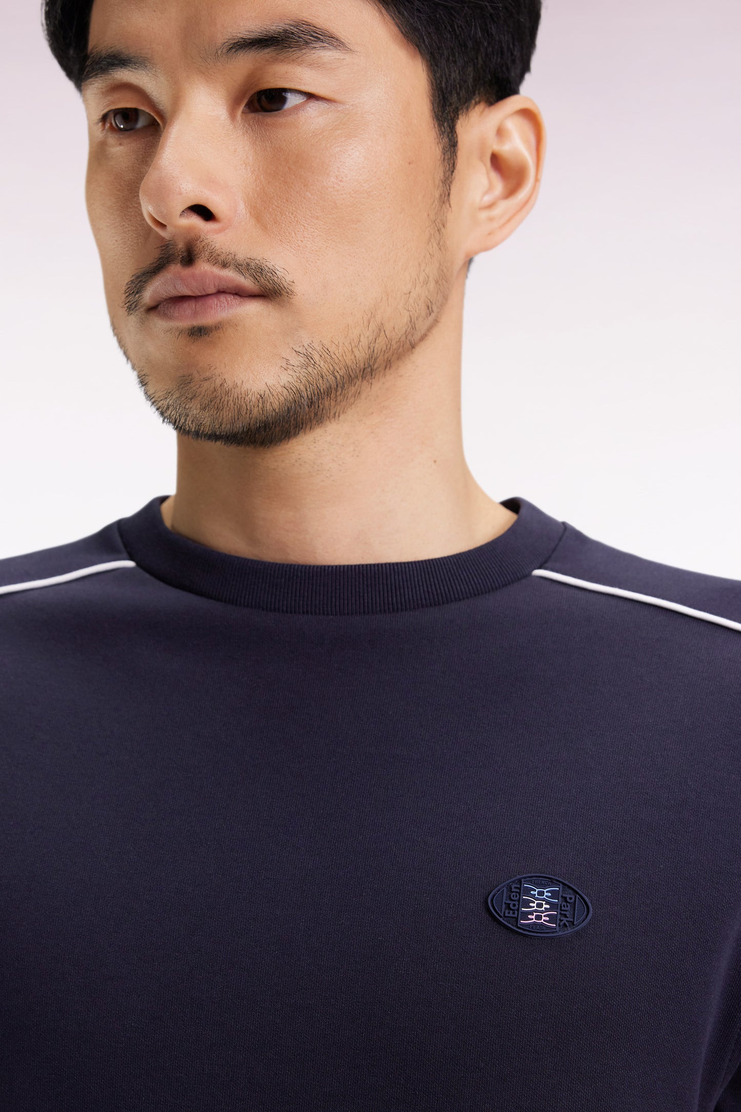 Navy fleece sweatshirt with colored piping