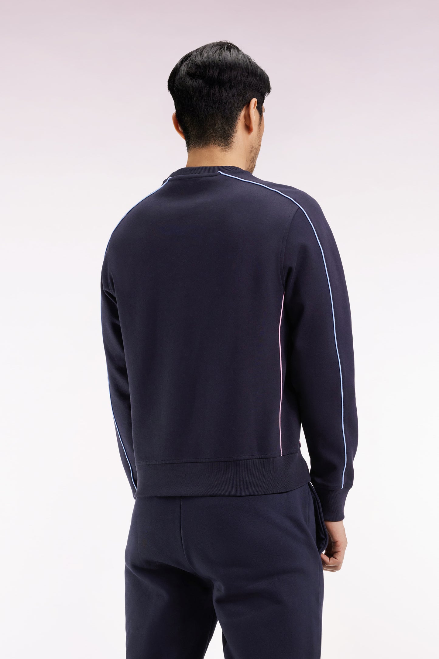 Navy fleece sweatshirt with colored piping
