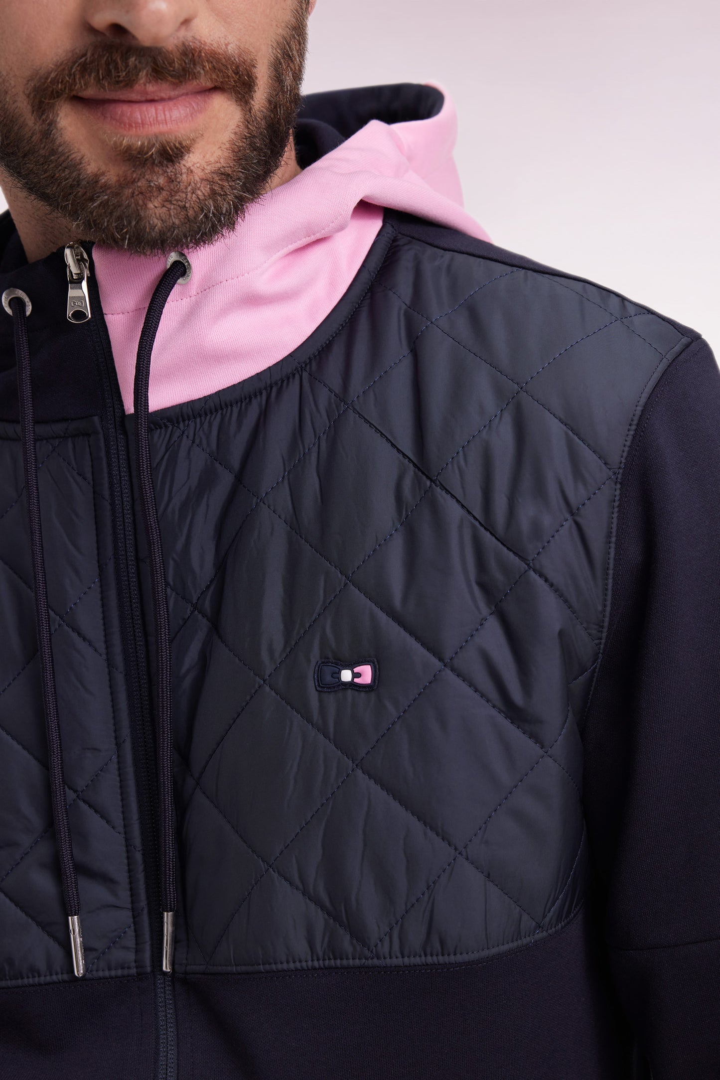 Zipped sweatshirt in navy and pink quilted bimaterial interlock
