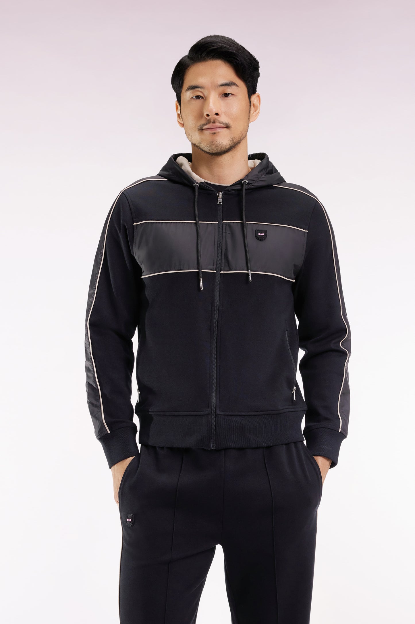 Zip-up hooded sweatshirt in black and beige fleece and nylon
