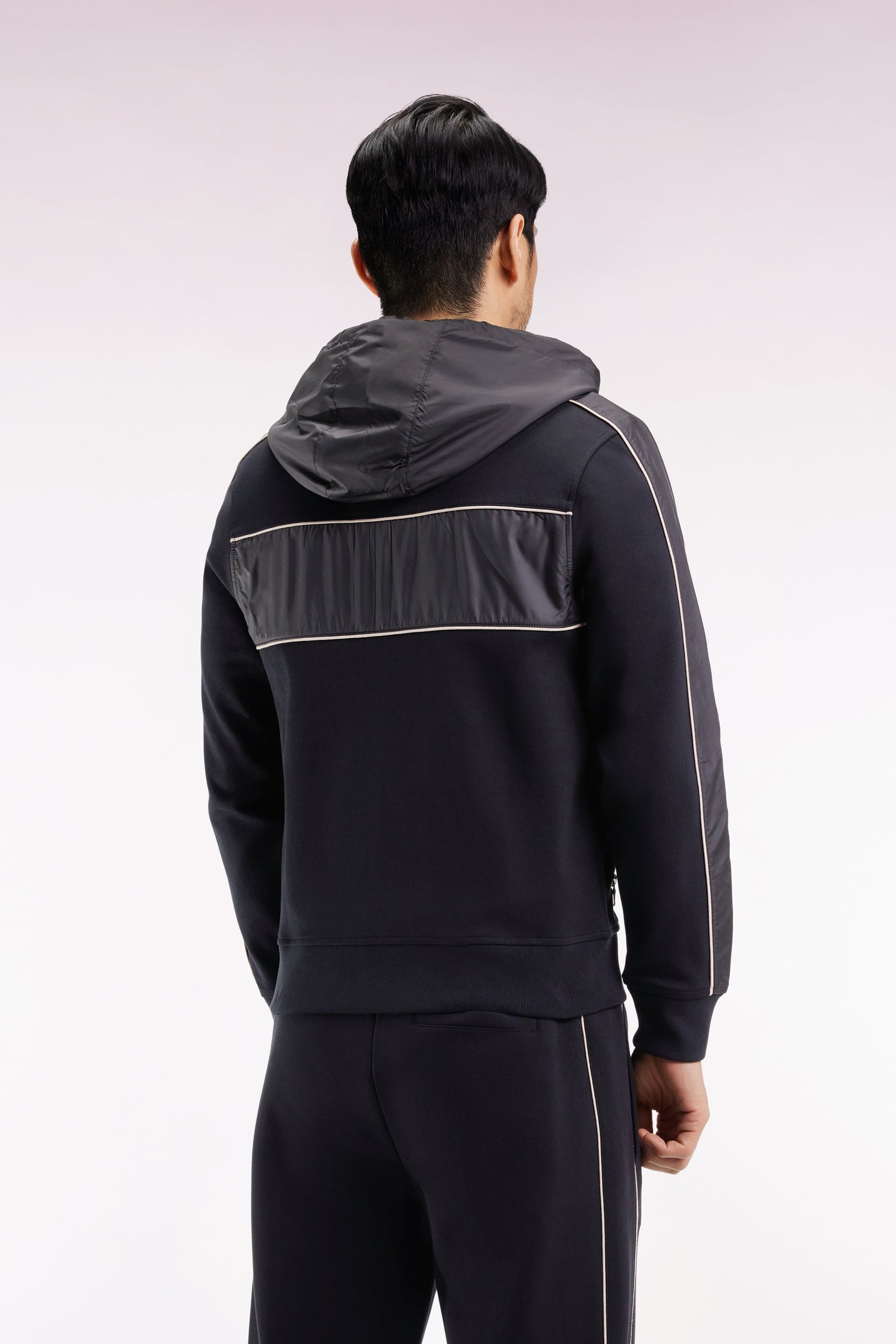 Zip-up hooded sweatshirt in black and beige fleece and nylon