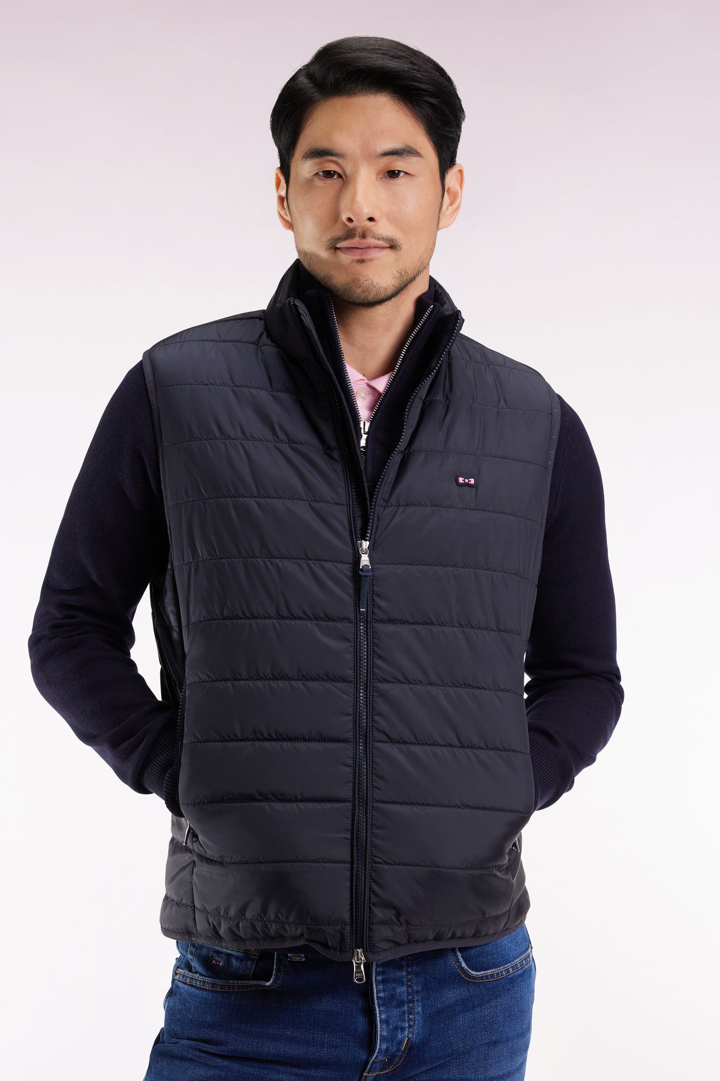 Sleeveless down jacket in navy quilted nylon