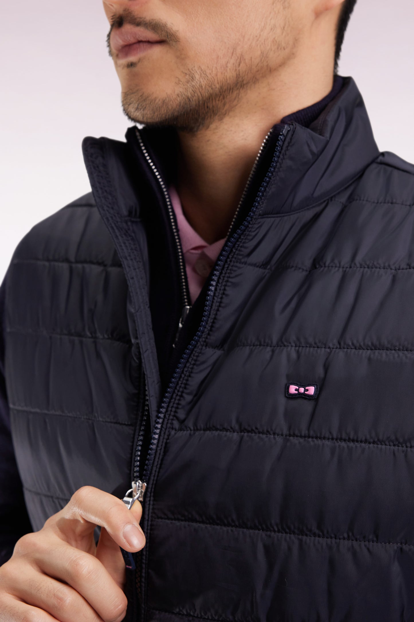 Sleeveless down jacket in navy quilted nylon