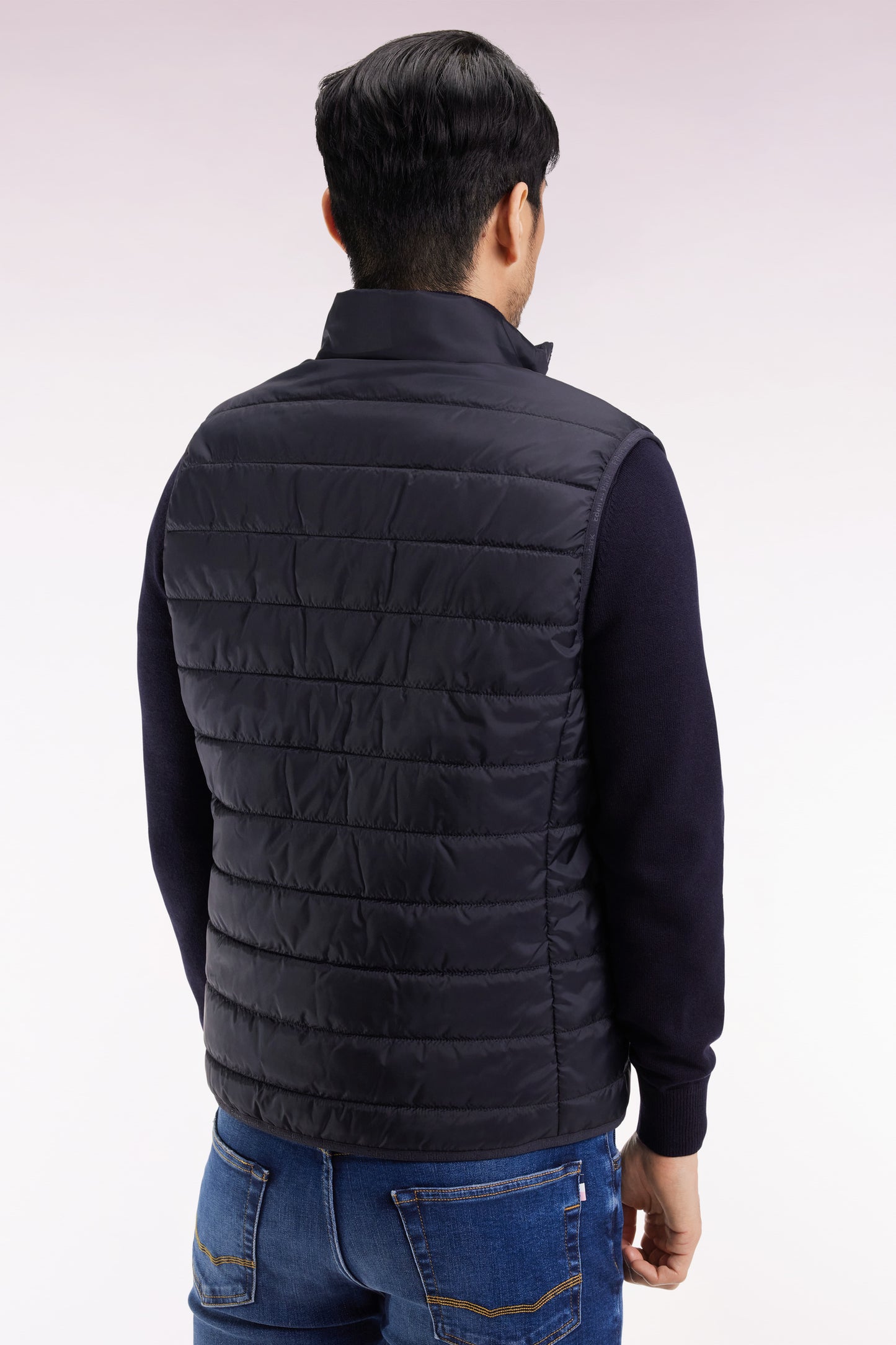 Sleeveless down jacket in navy quilted nylon
