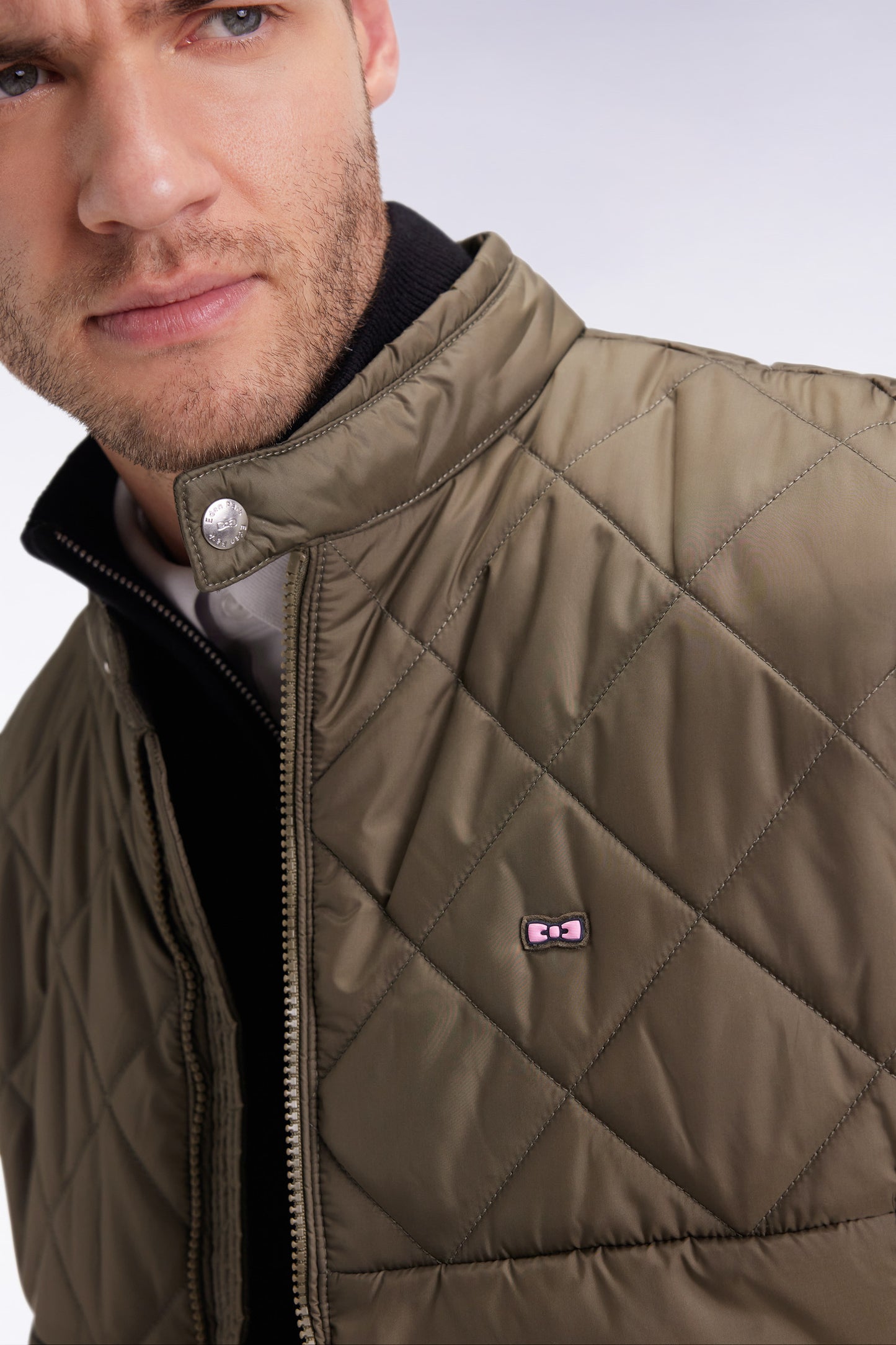 Sleeveless biker-collar jacket in khaki quilted nylon