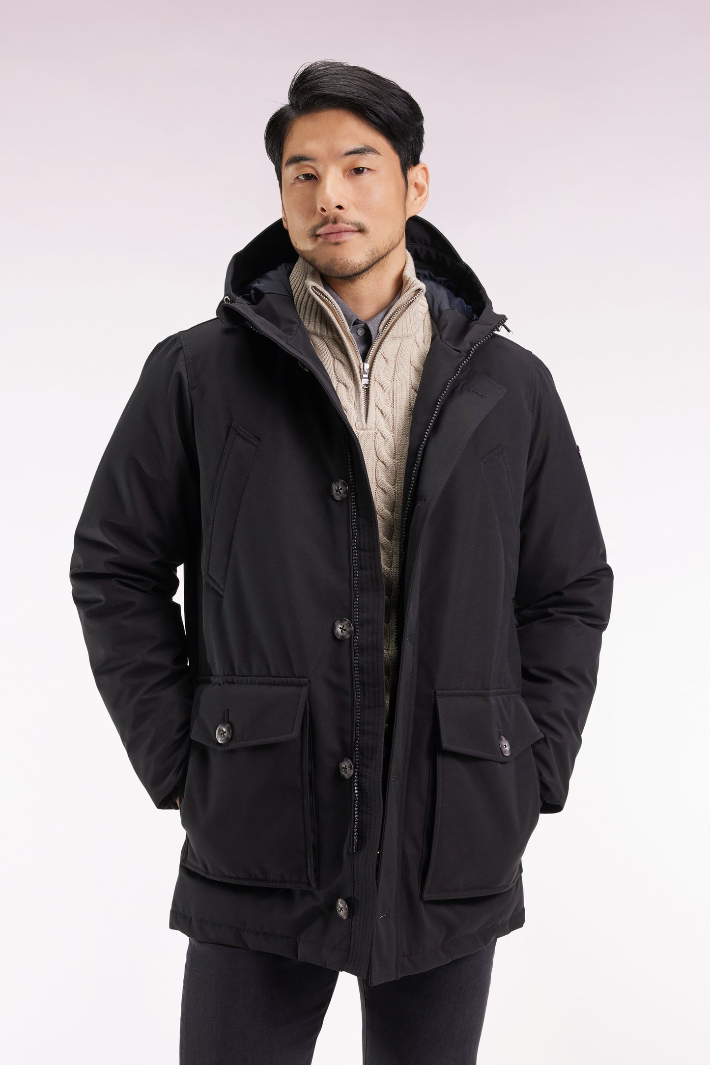 Short parka in black nylon with patch pockets