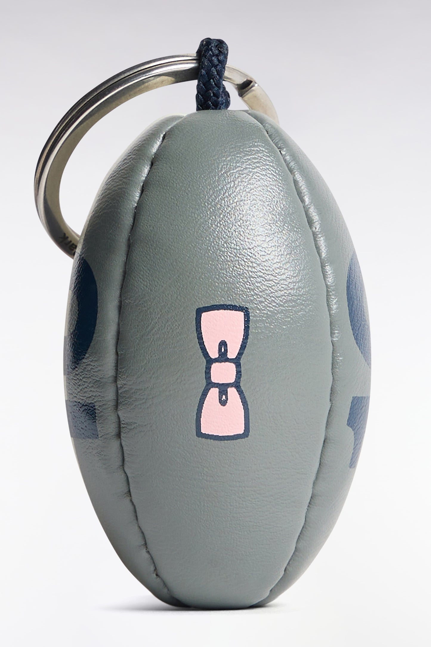 Porte-clés caoutchouc ballon de rugby numéro 10 kaki