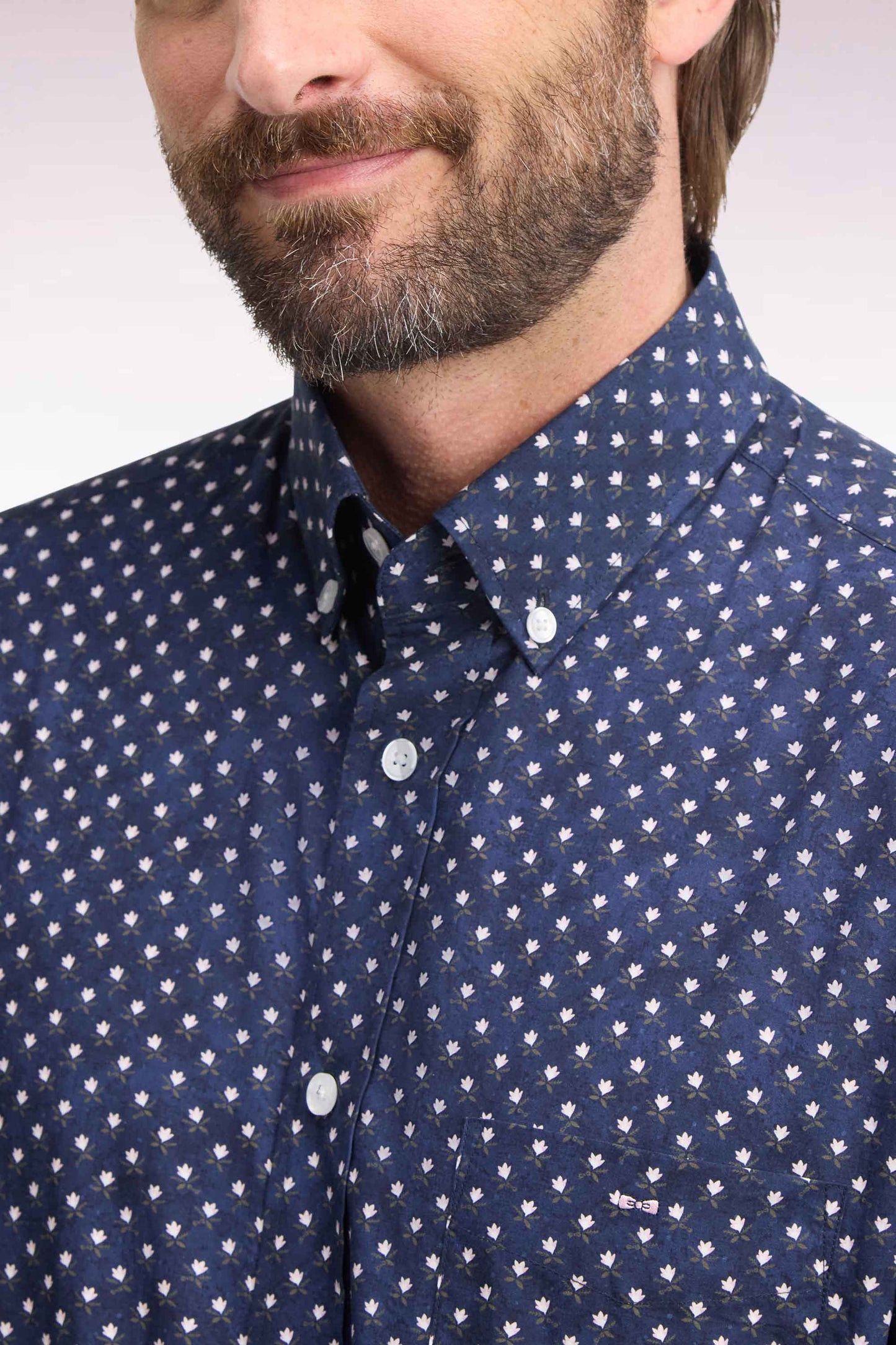 Navy cotton shirt with white flower micro-patterns, straight cut