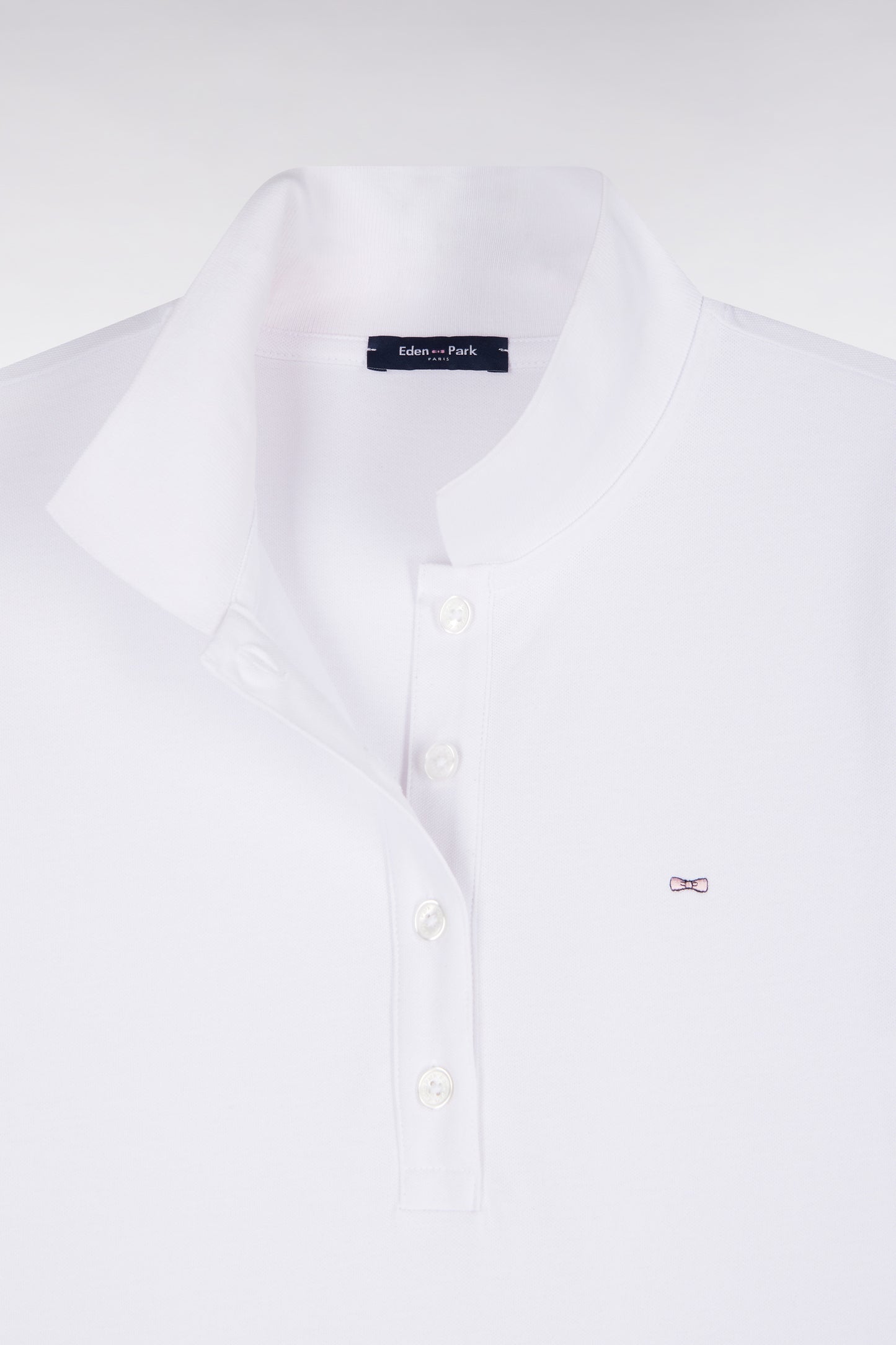Polo manches courtes en coton stretch blanc coupe ajustée