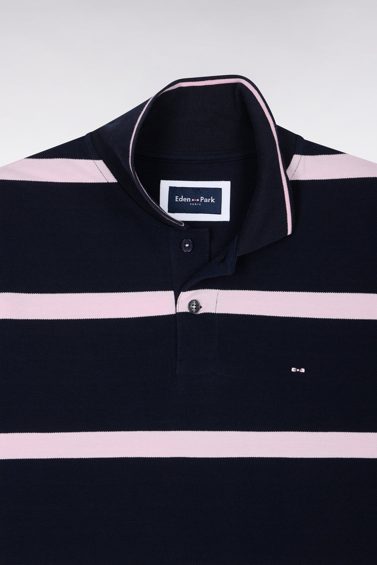 Polo manches courtes marine à rayures roses coupe droite