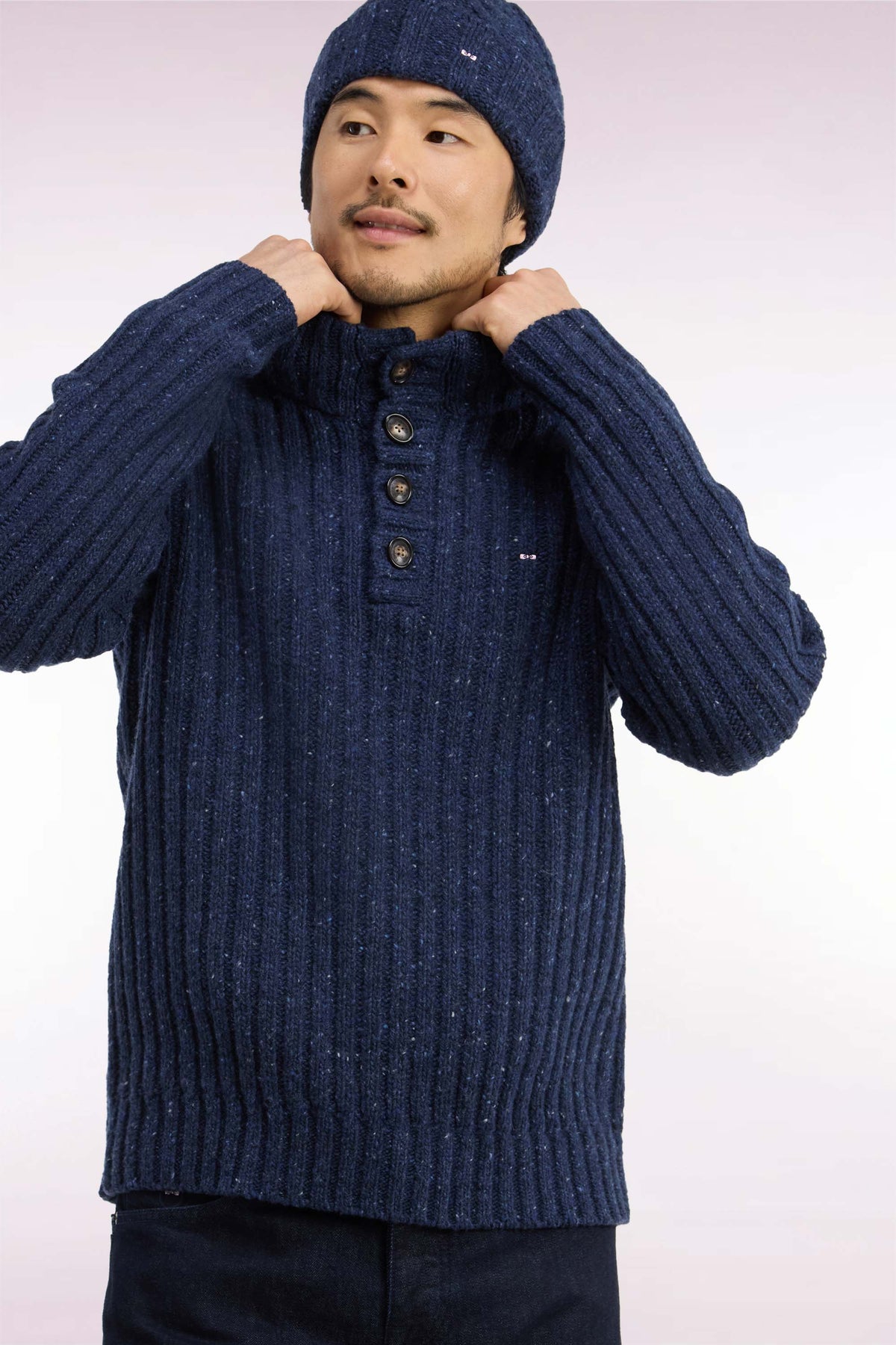 Buttoned high-neck sweater in heather blue ribbed chunky knit