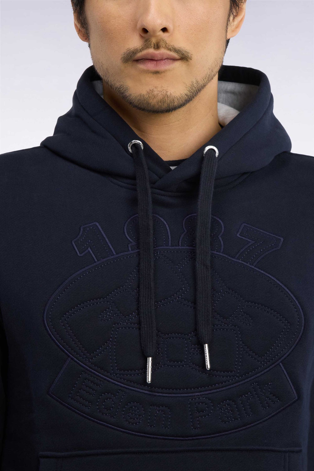 Straight cut embroidered navy cotton fleece hooded sweatshirt