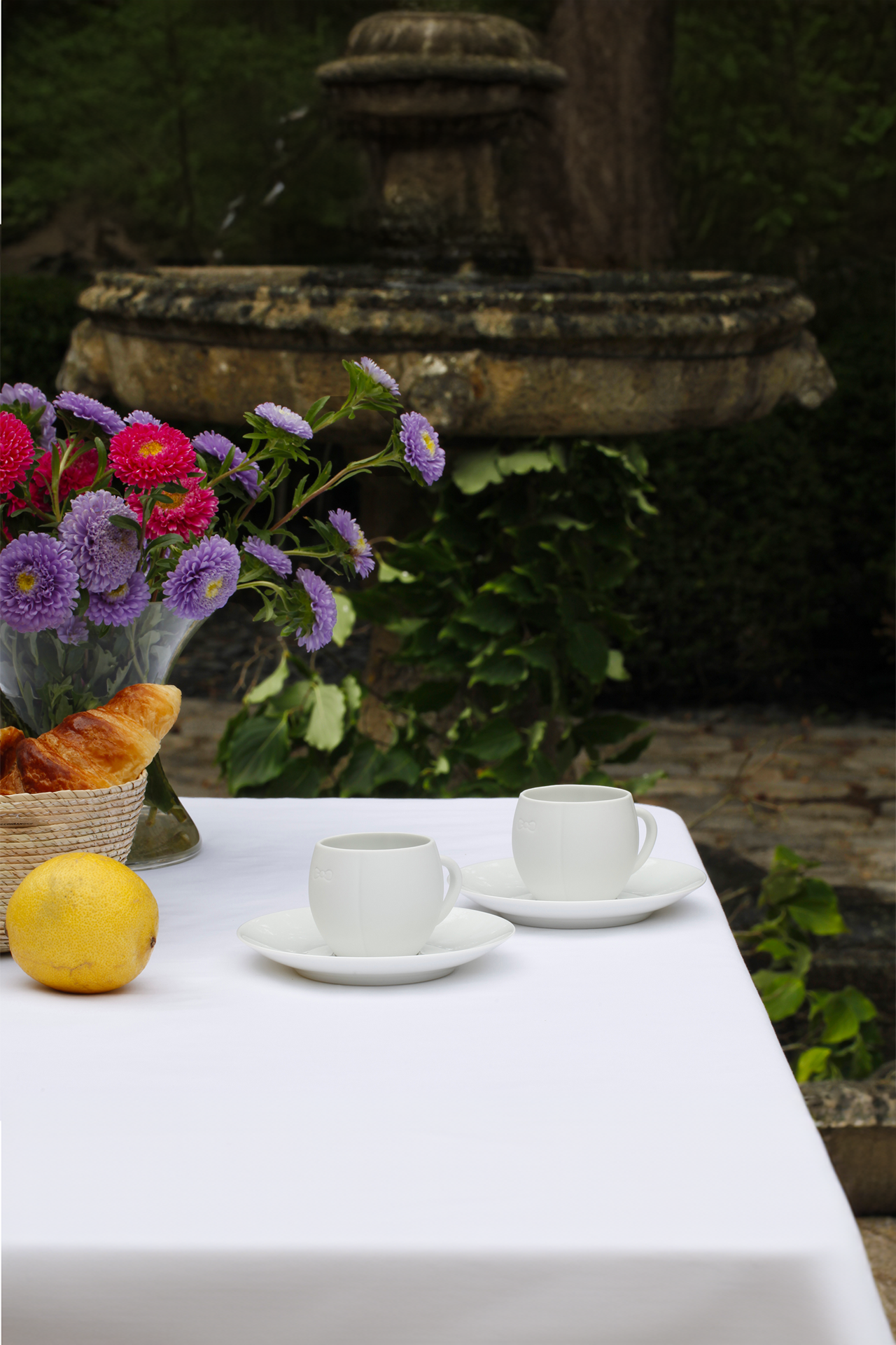 Set of 2 white Limoges porcelain cups and coasters